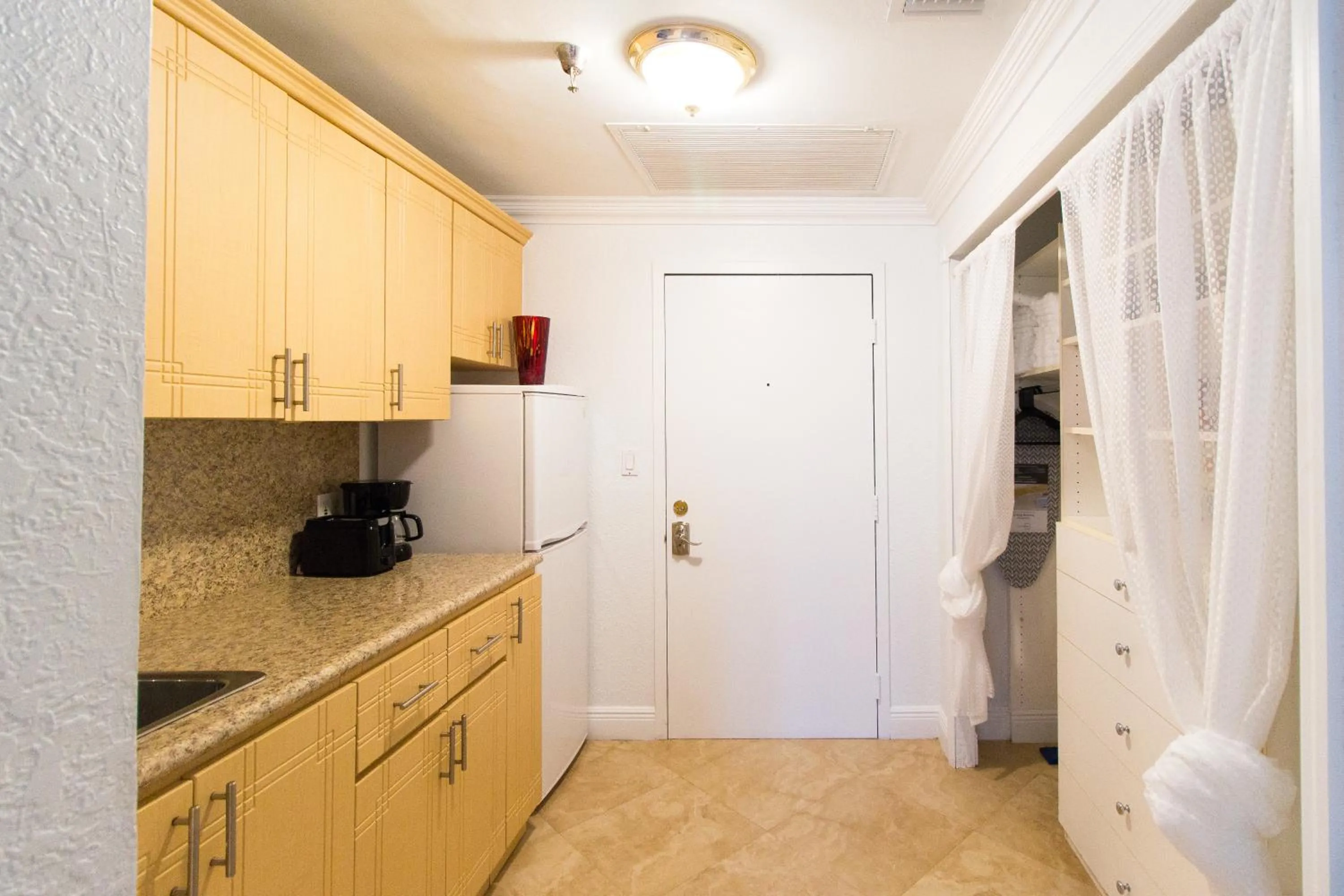 Kitchen or kitchenette in Barbizon on Ocean Drive Apartments