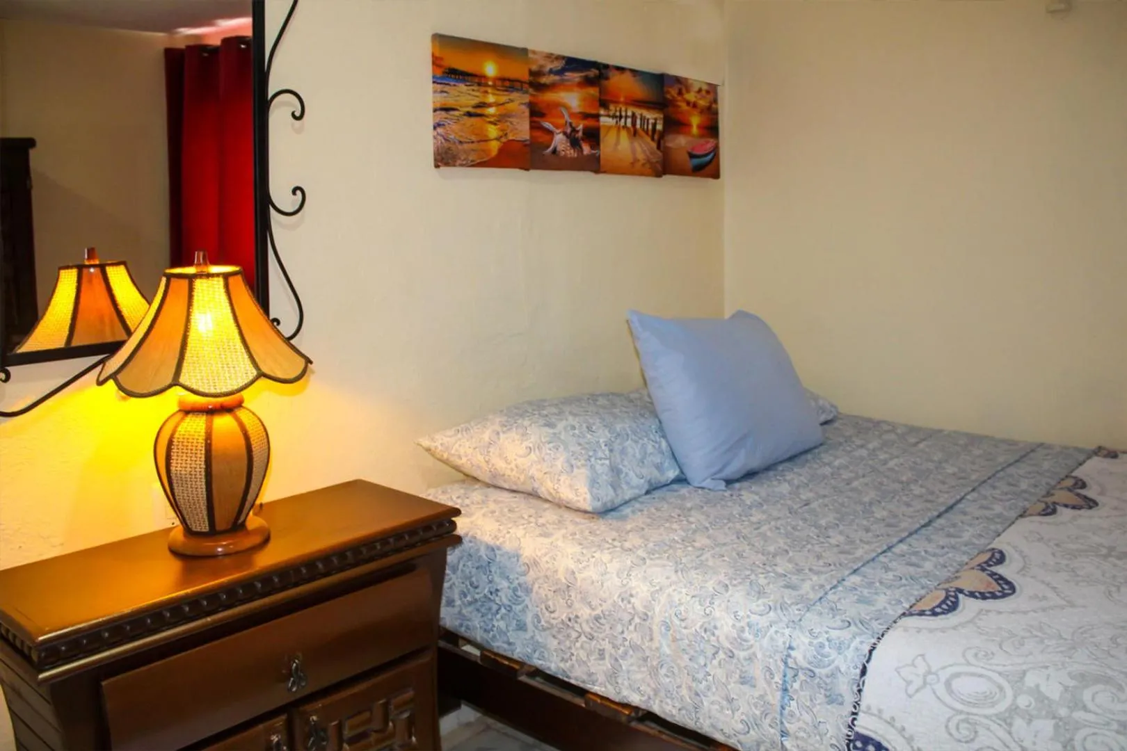 Bed in Cande's Apartments