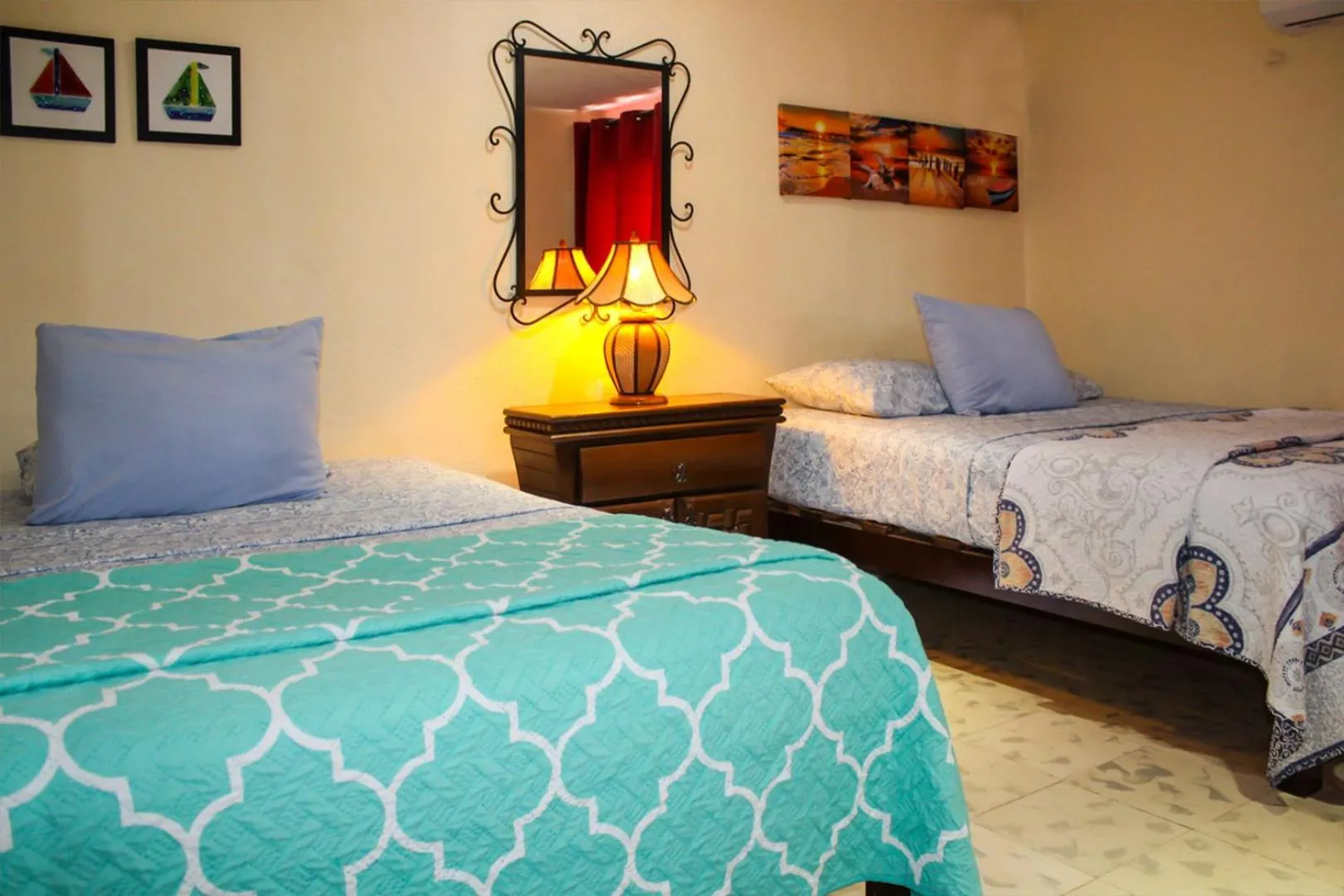 Bed in Cande's Apartments