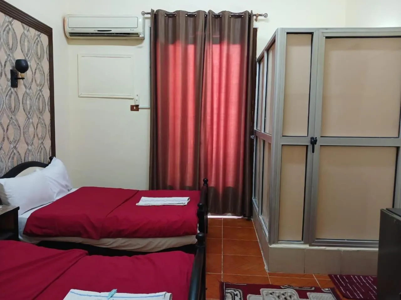 Bed in New Palace Hotel