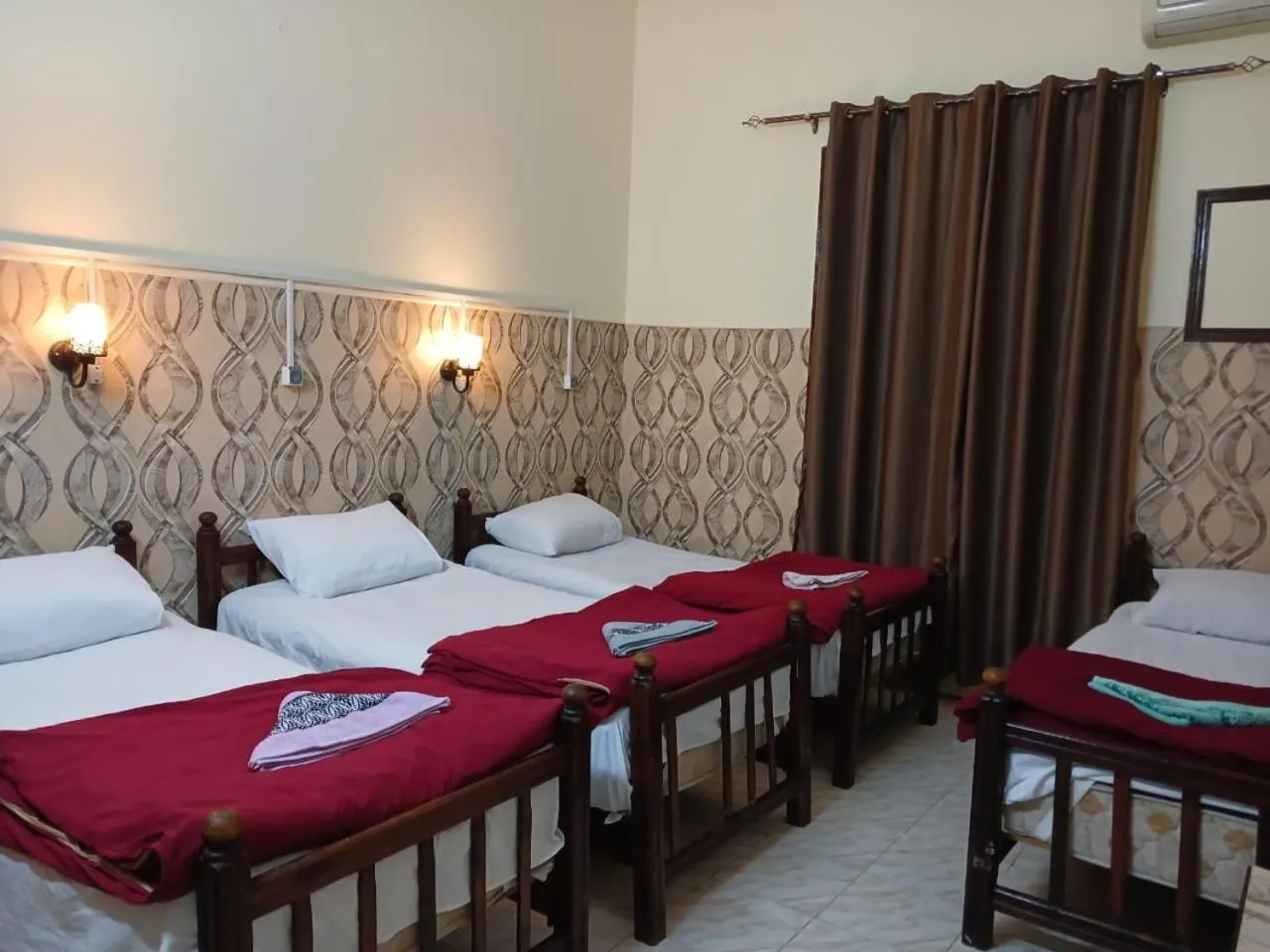 Bed in New Palace Hotel