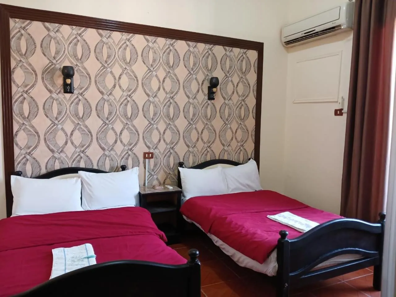 Bed in New Palace Hotel