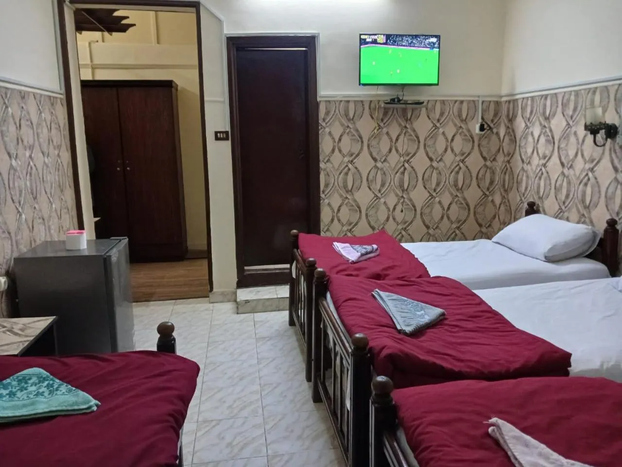 Bed in New Palace Hotel