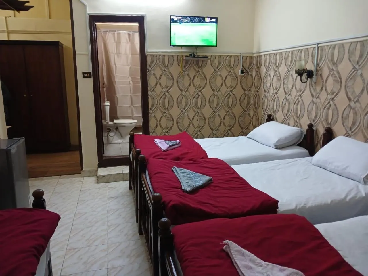 Bed in New Palace Hotel