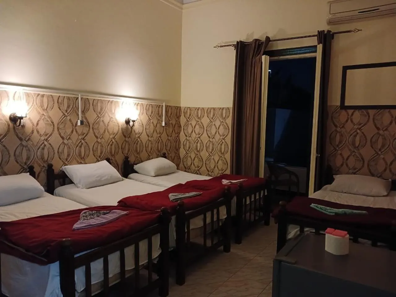 Bed in New Palace Hotel