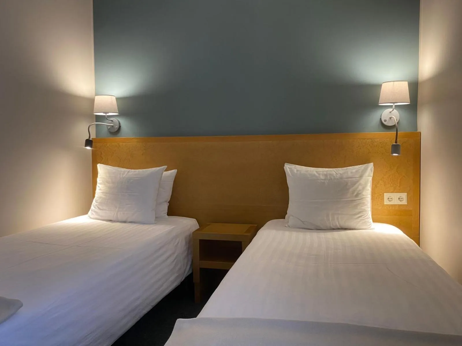 Bed in Hotel Kolumbs