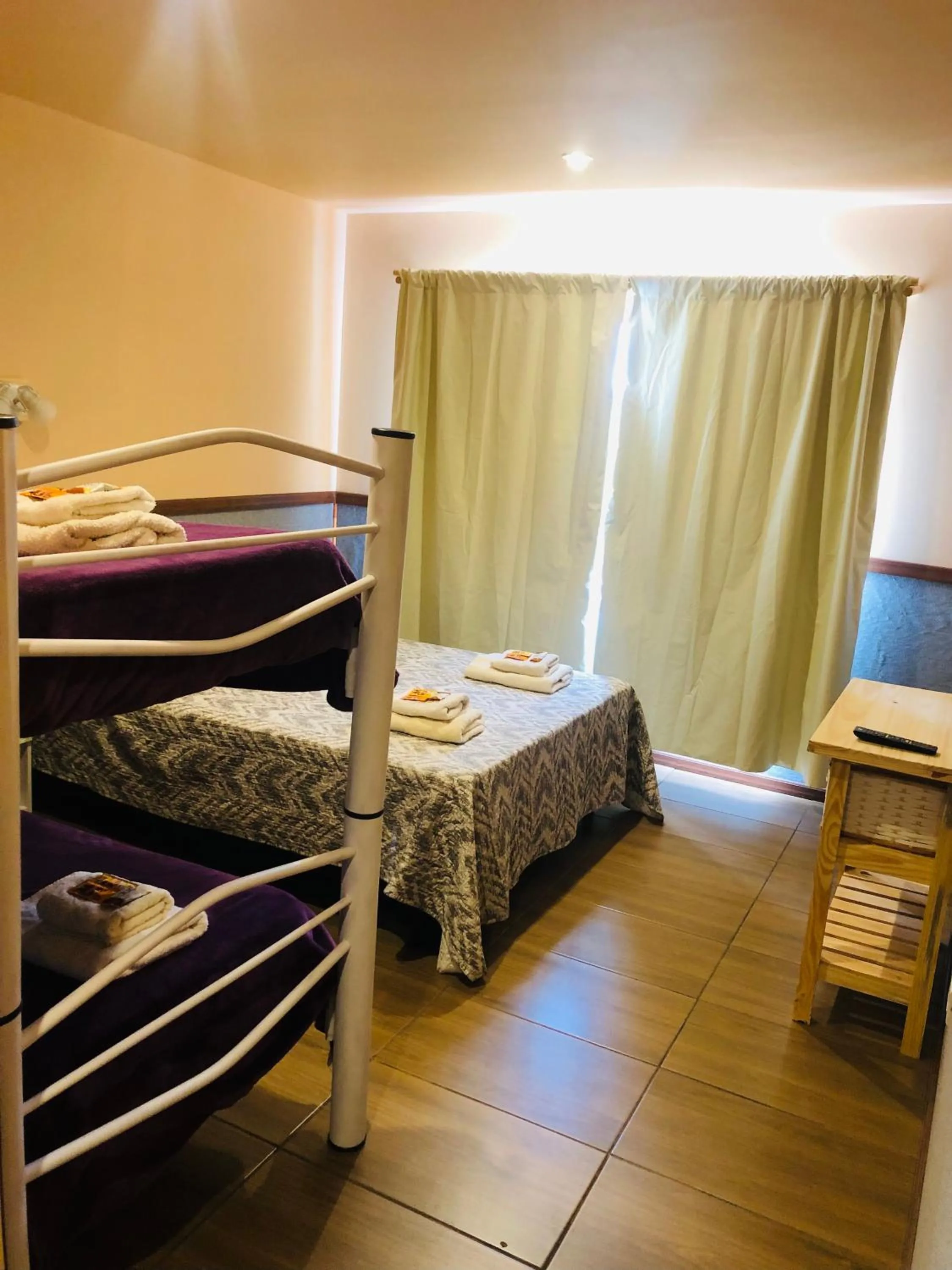 Quadruple Room with Lake View in Hotel Koi Mahik