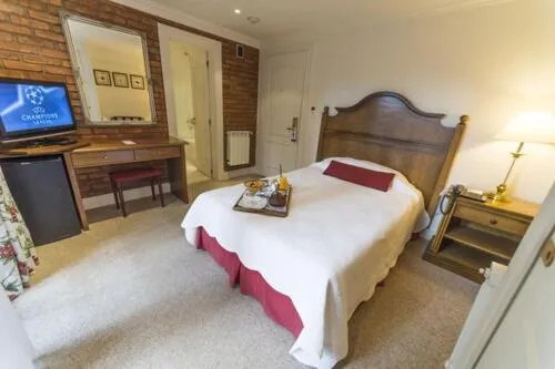 Bed in Hotel Posada Los Alamos