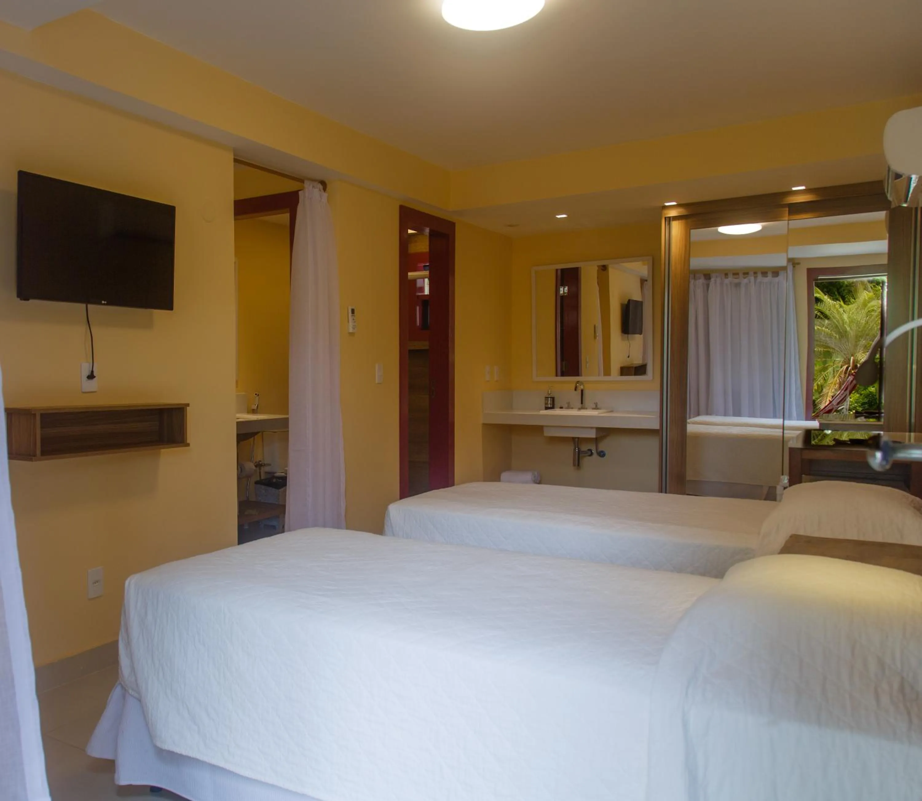 Bed in Hotel La Forêt & Beach Lounge