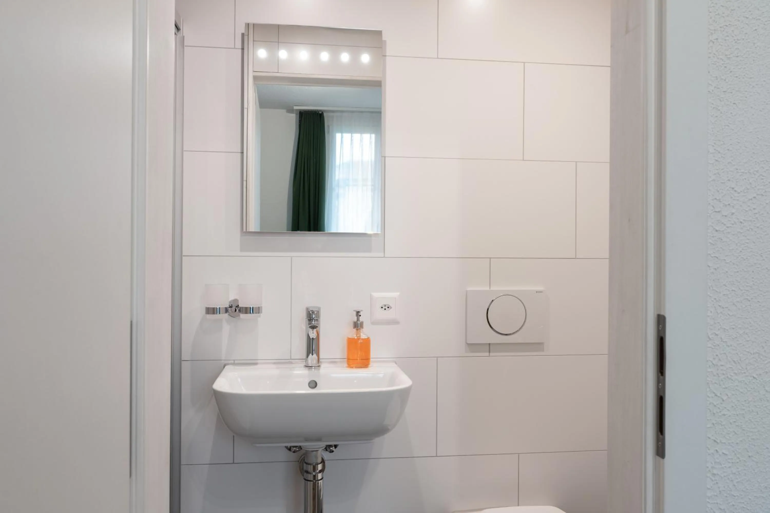 Bathroom in Interlaken Apartments