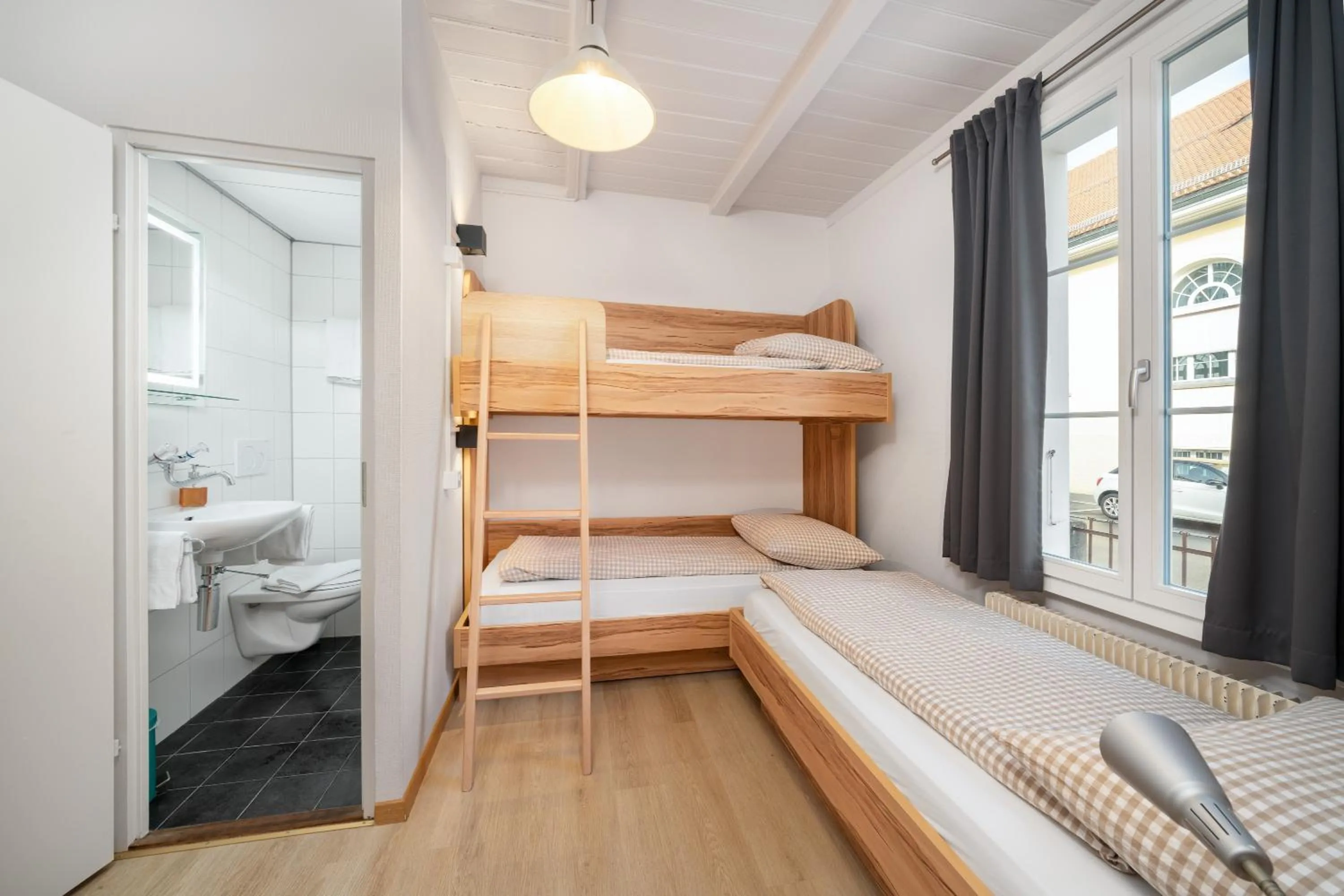 Bathroom, Bed in Interlaken Apartments