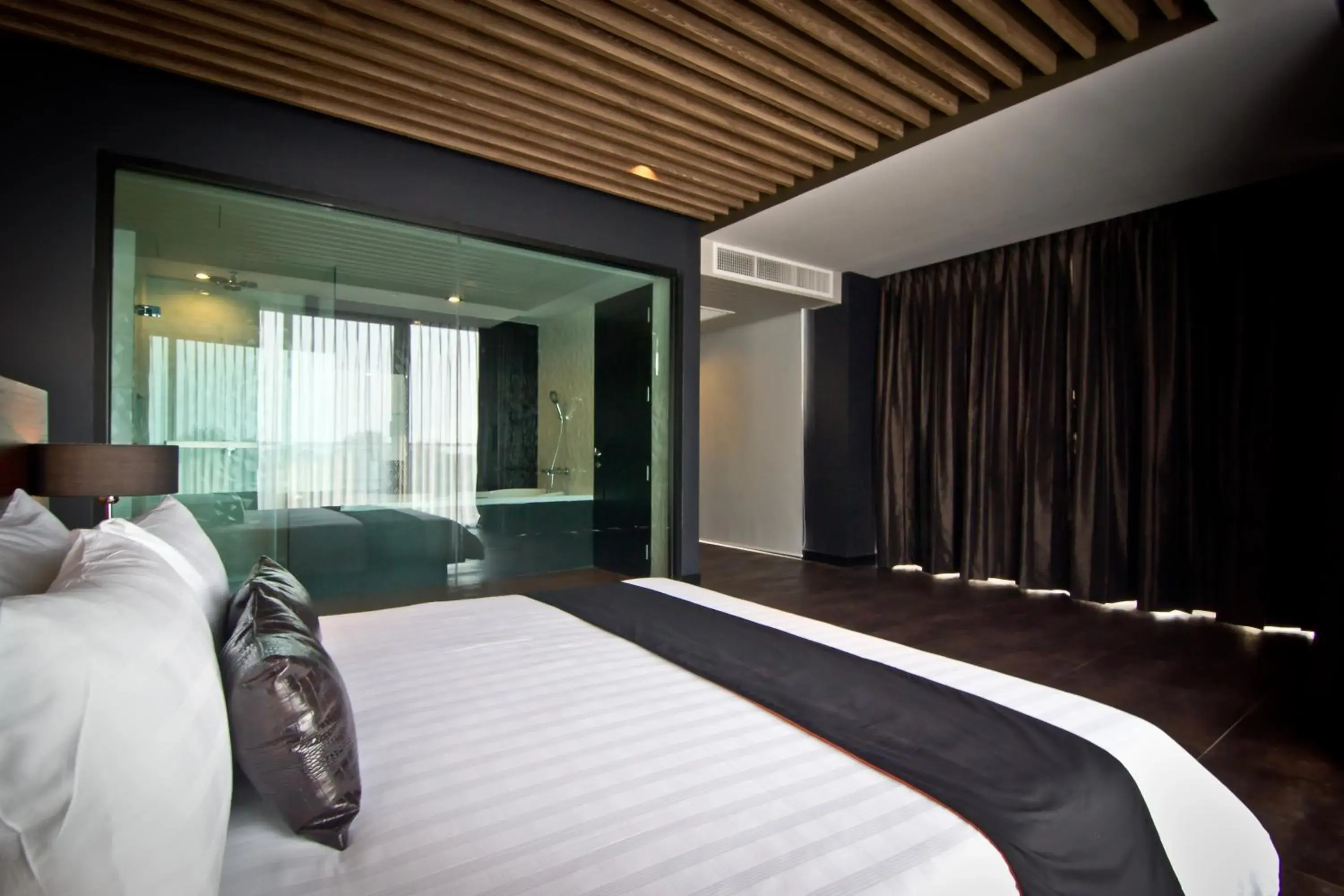 Bed in Tsix5 Hotel