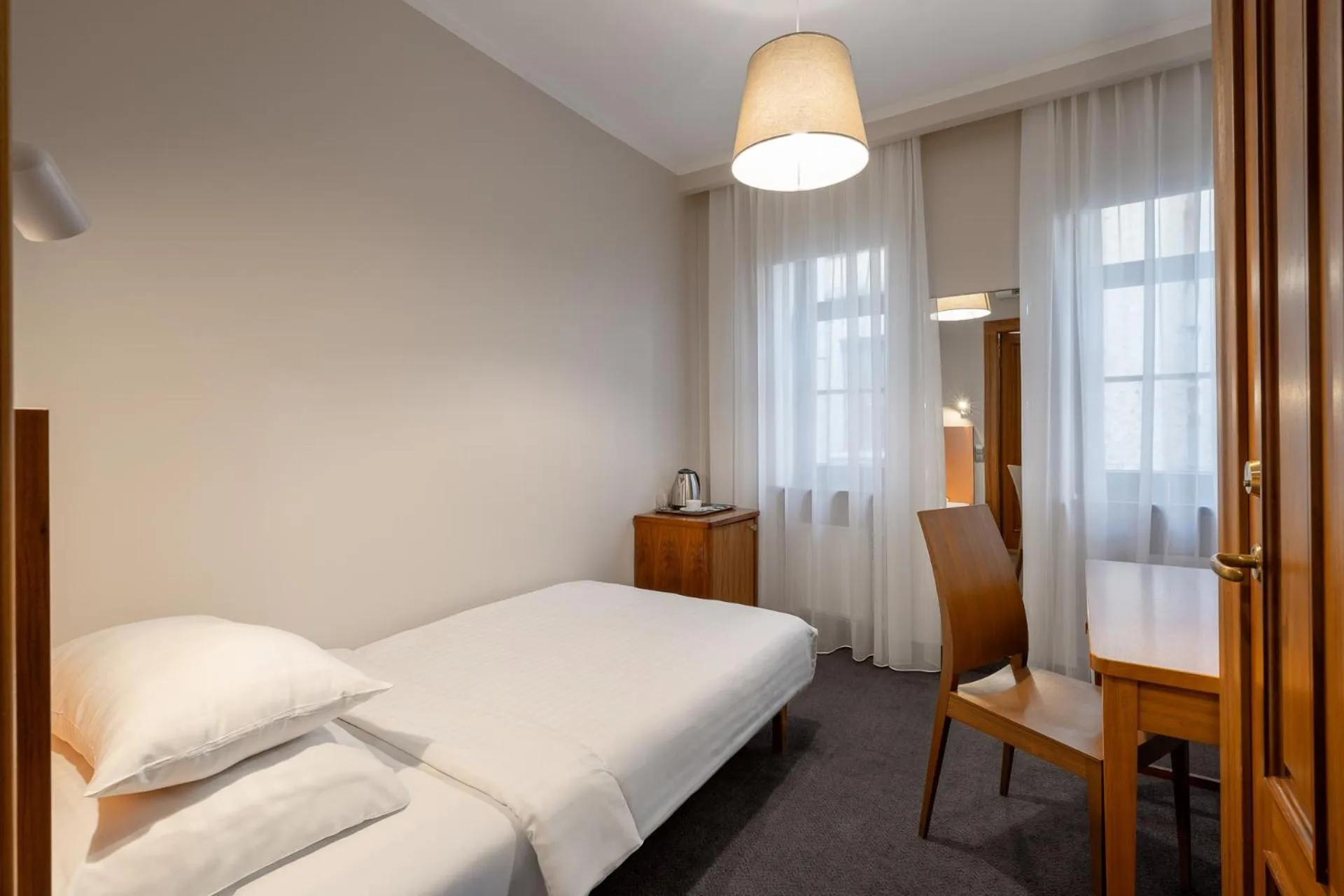 Bed in RIJA Riga City Centre Hotel