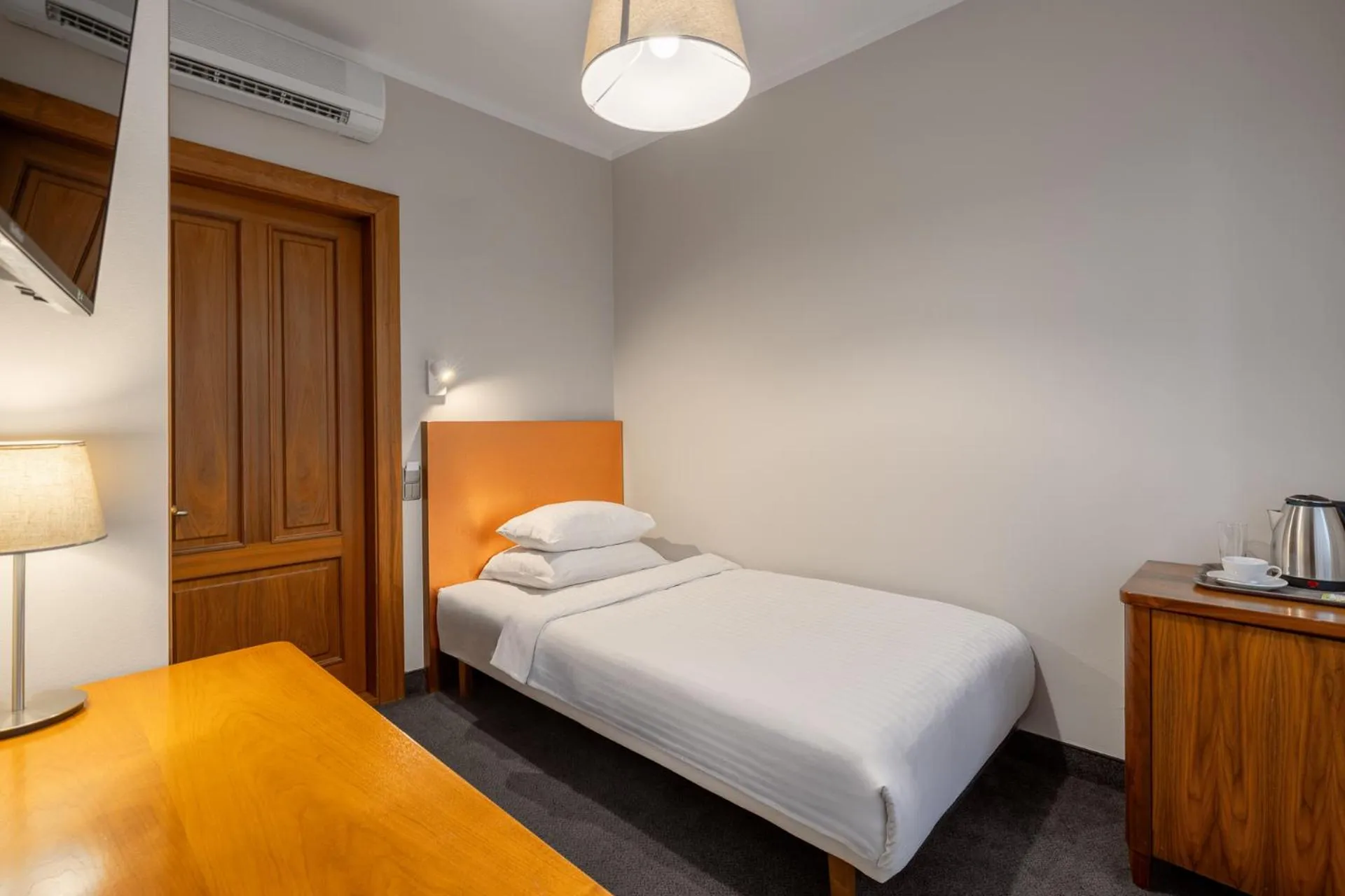 Bed in RIJA Riga City Centre Hotel