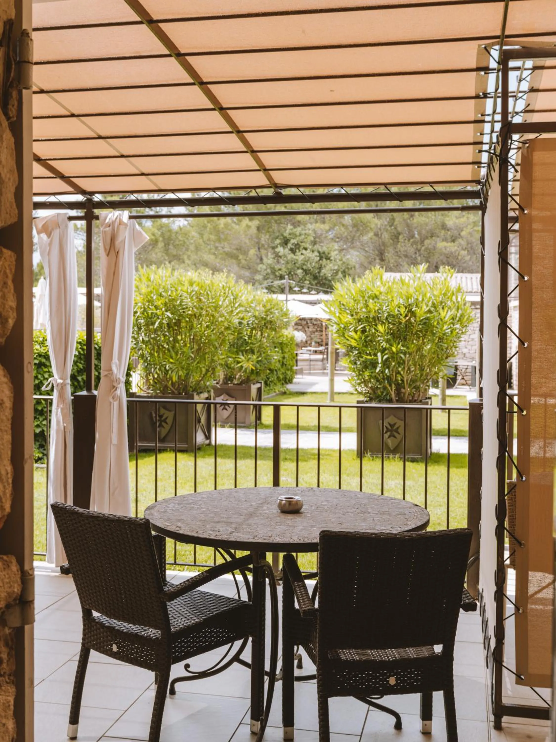 Patio in Le Phébus & Spa – Relais & Châteaux