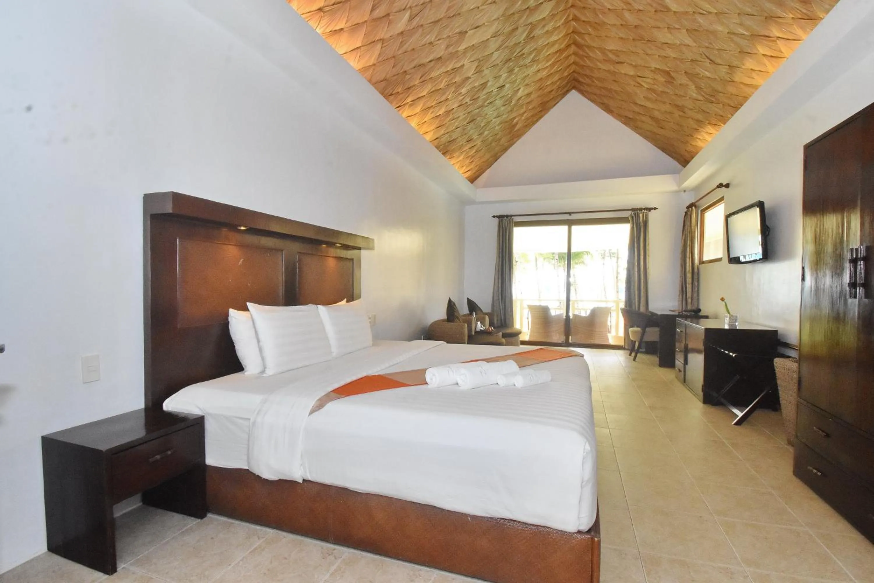 Bed in Ambassador In Paradise