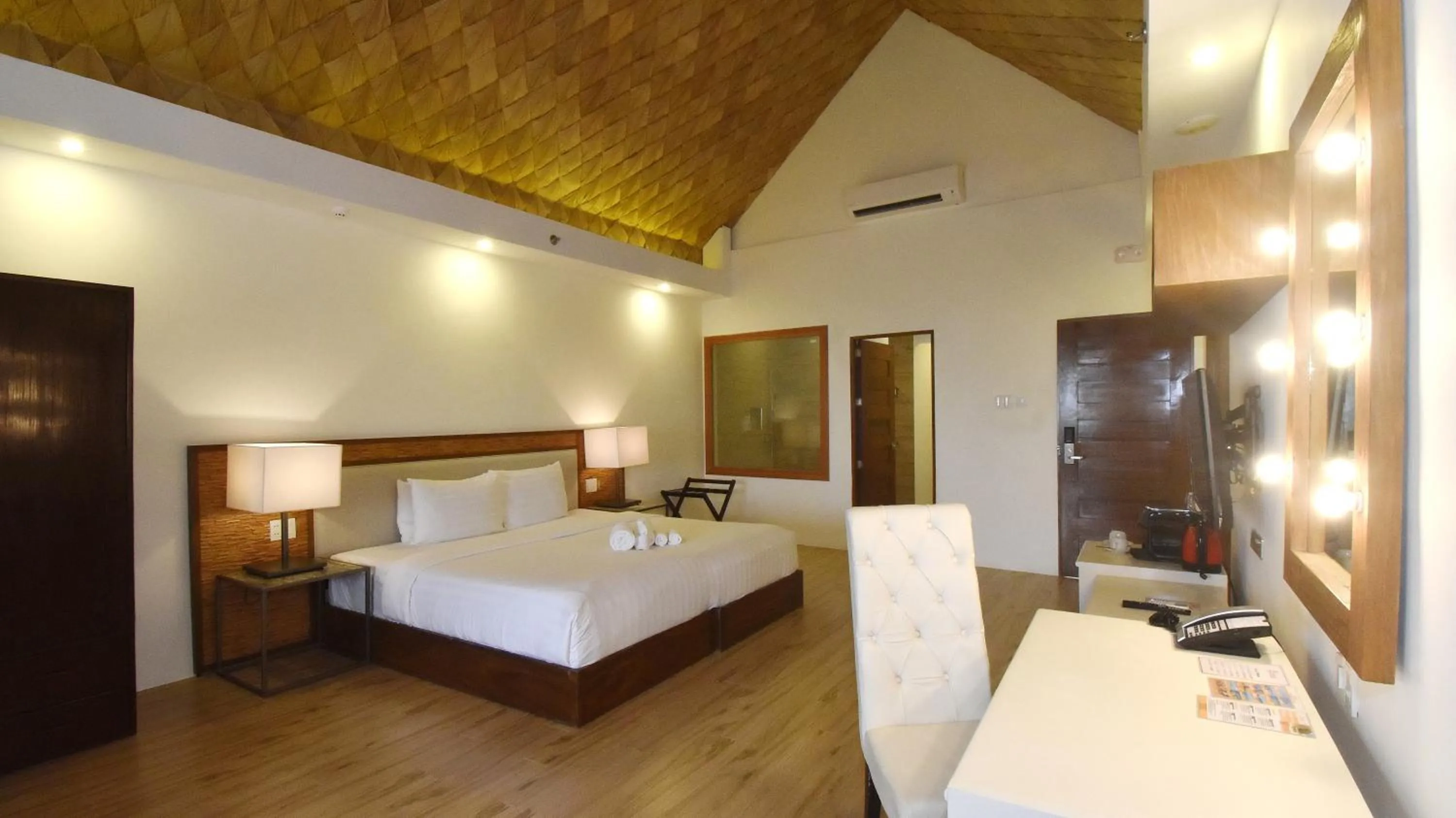 Bed in Ambassador In Paradise