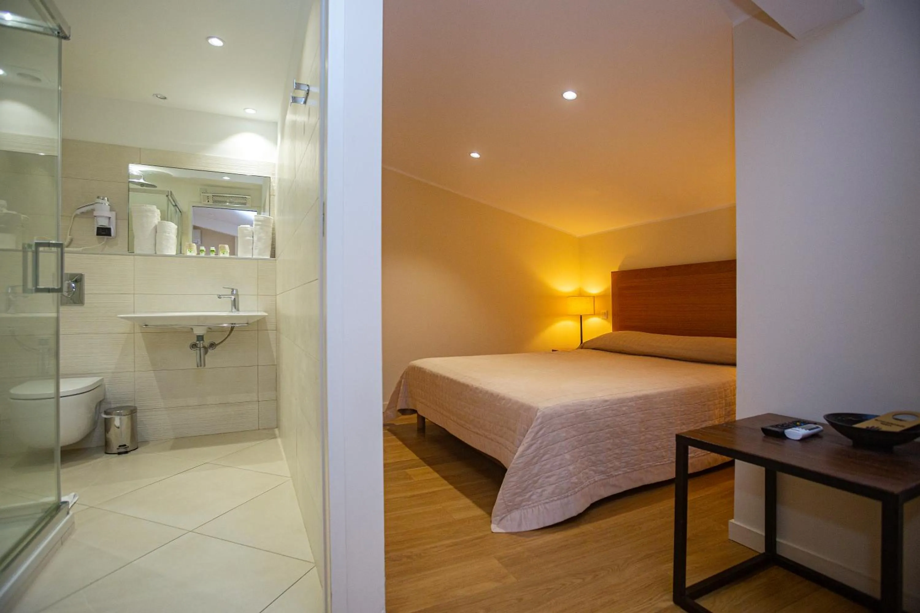 Bed in Hotel Cesario