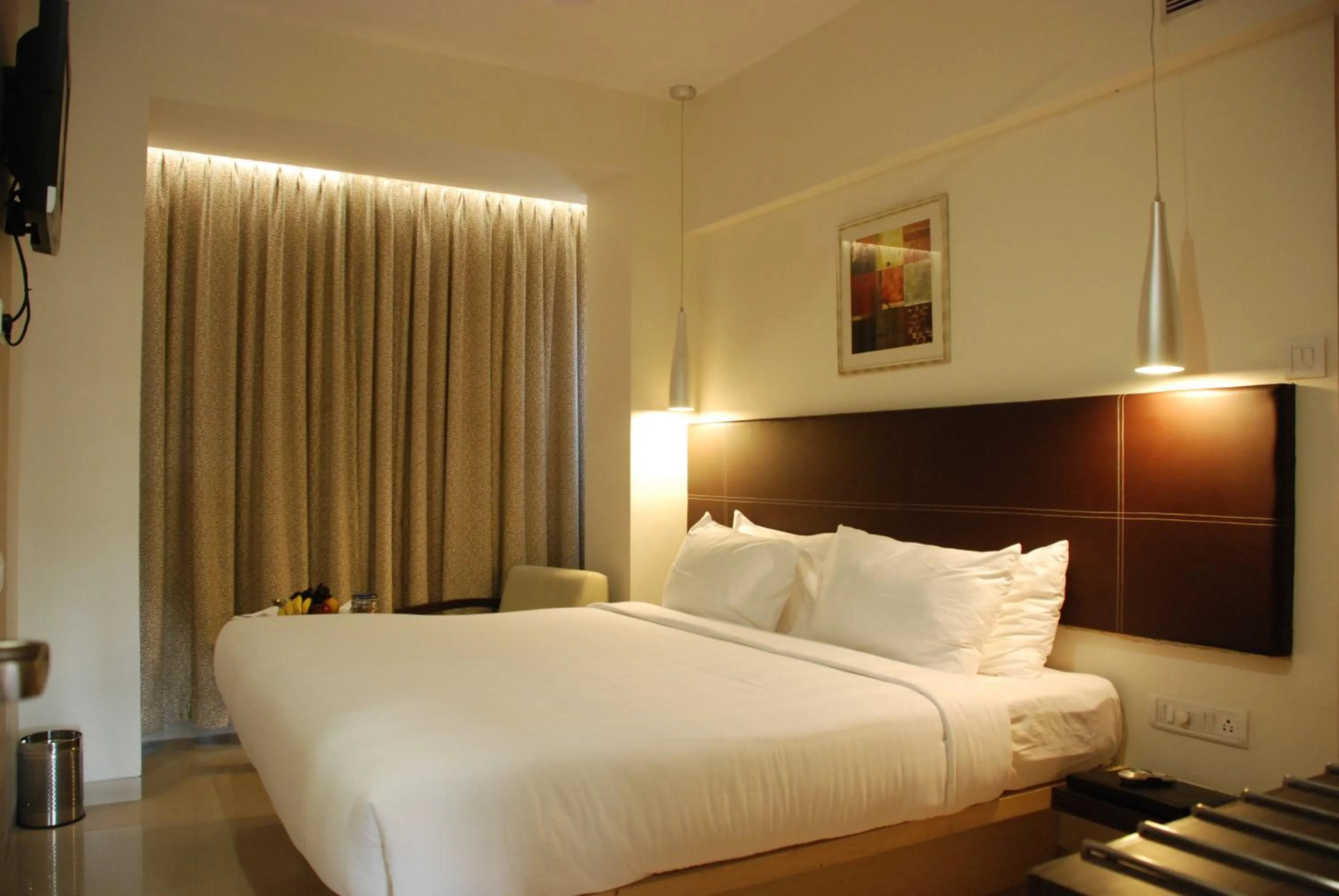 Bed in The Oriental Residency