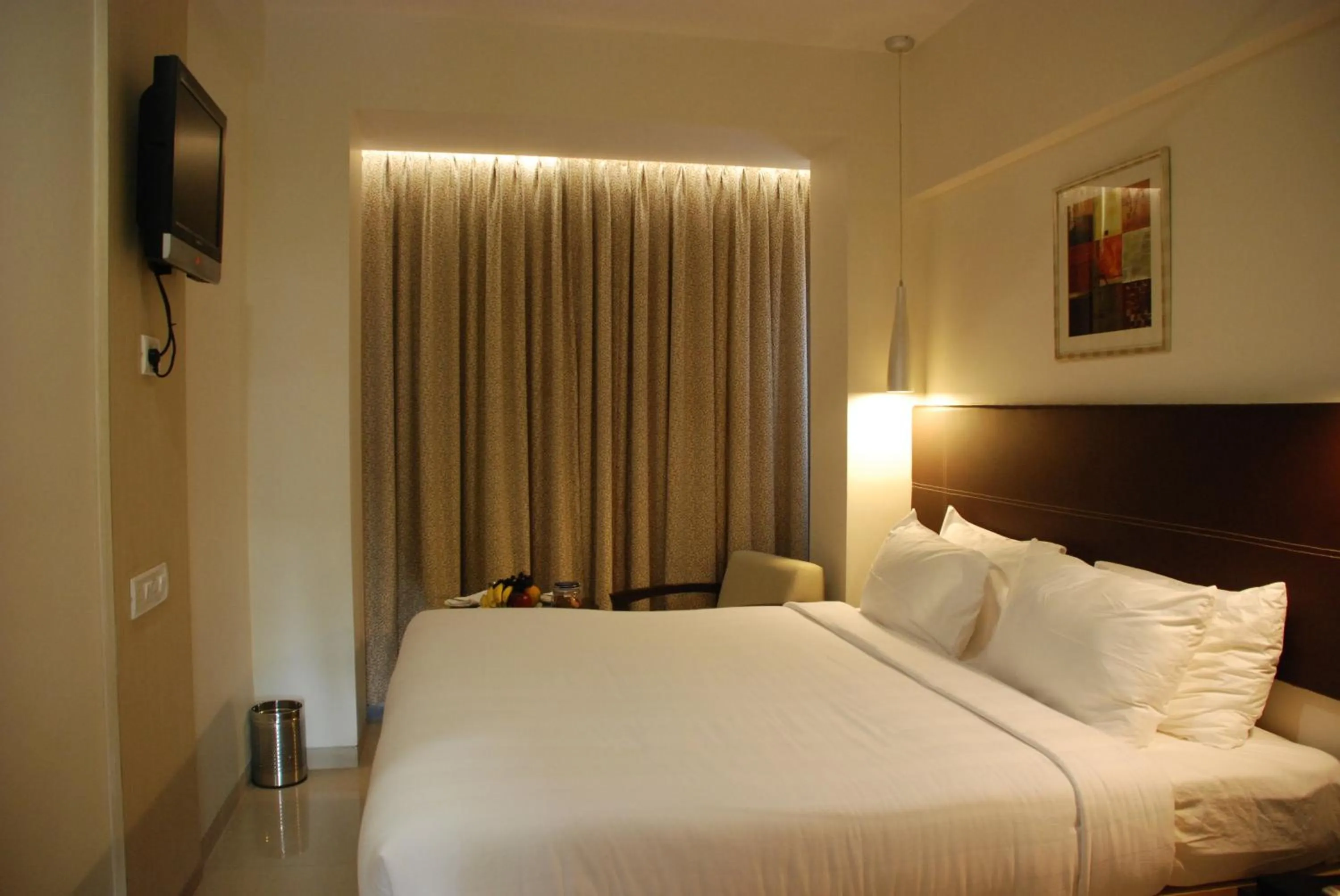 Bed in The Oriental Residency