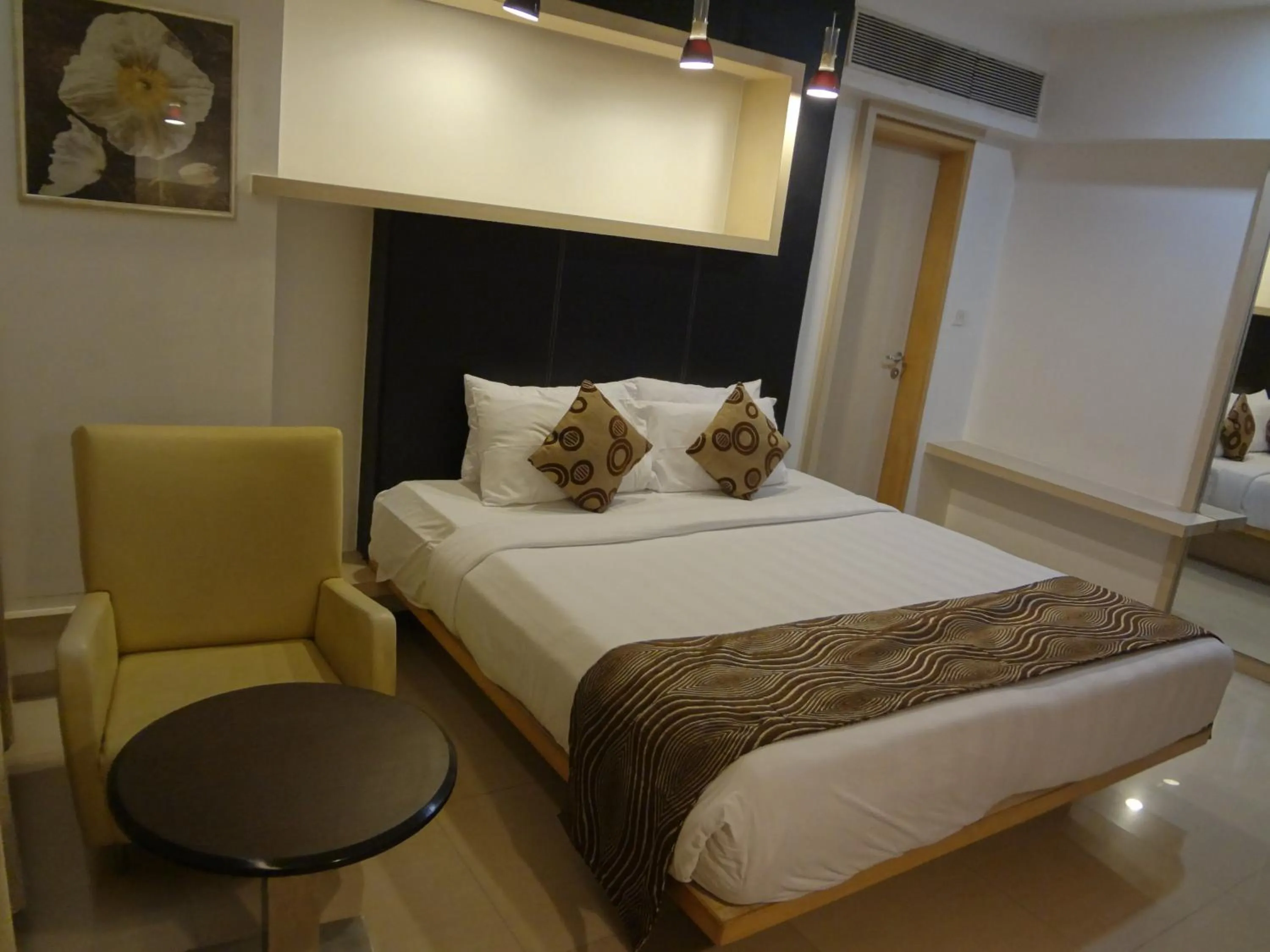 Bed in The Oriental Residency