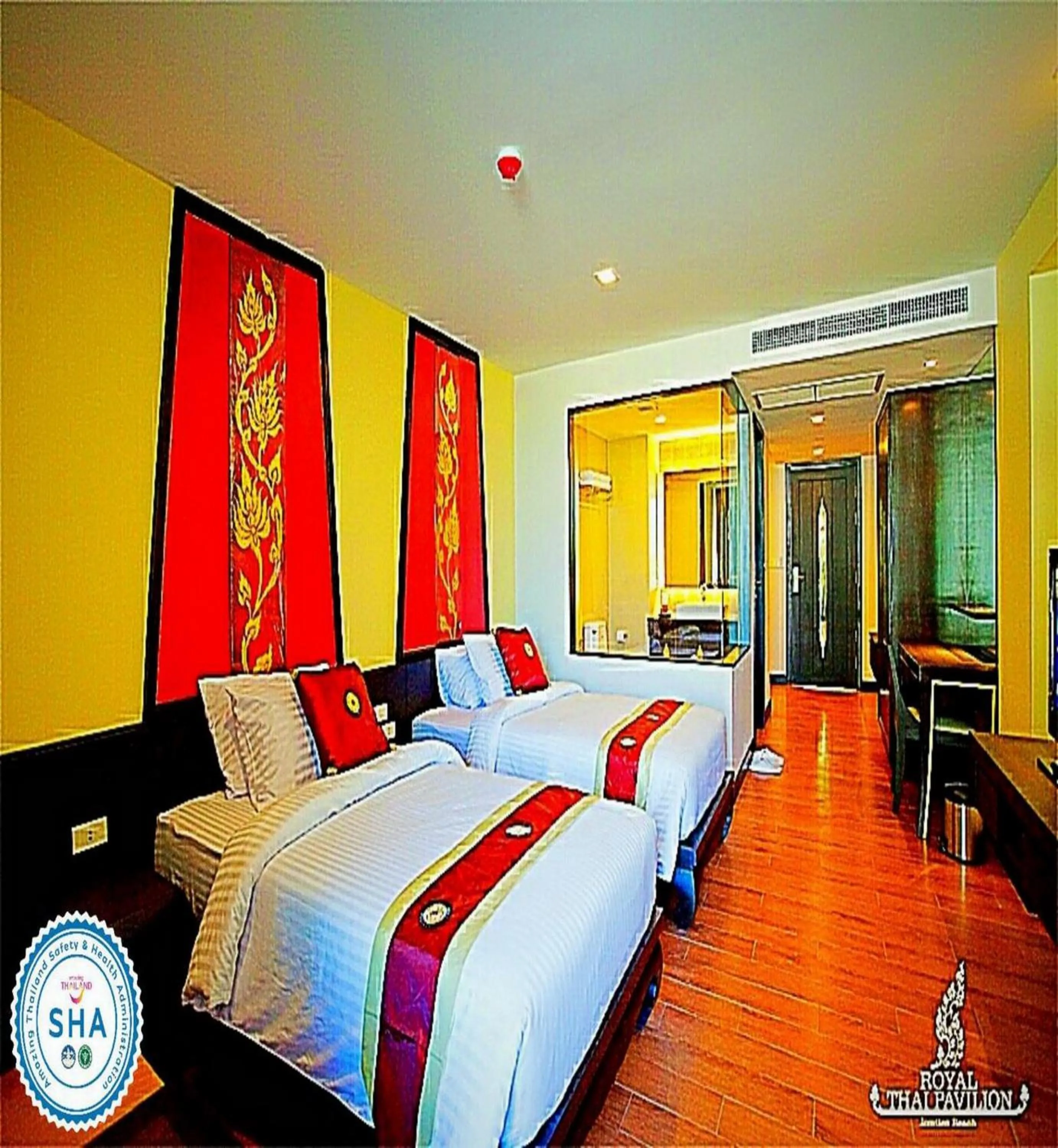 Bed in Royal Thai Pavilion Jomtien Hotel