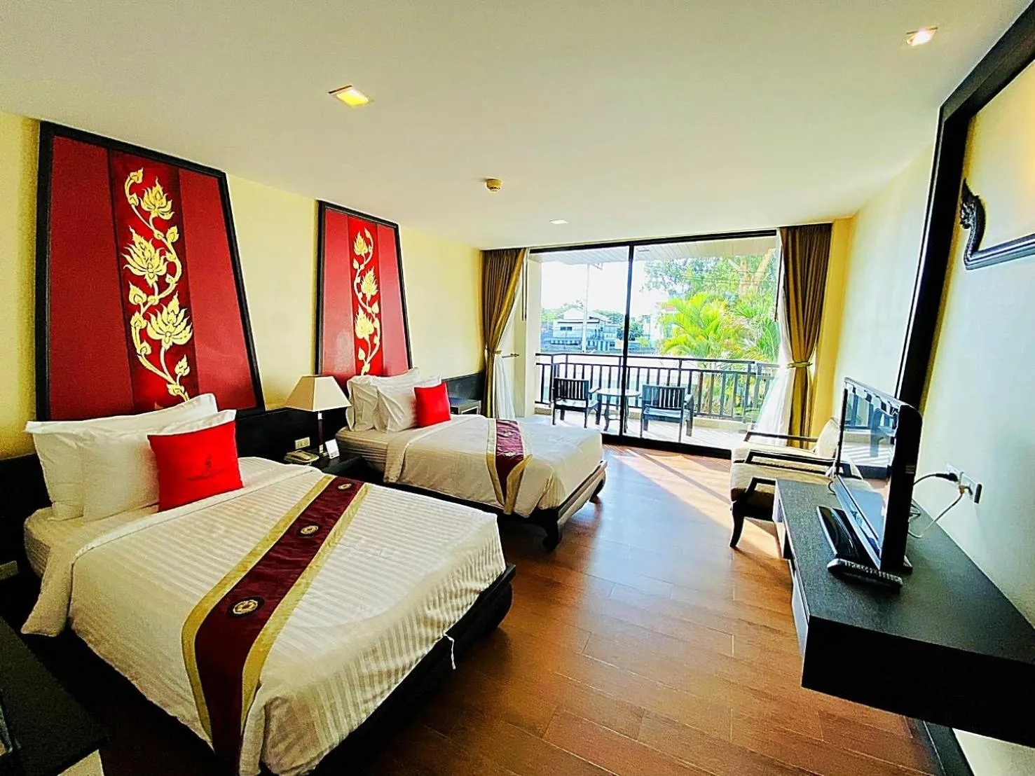 Bed in Royal Thai Pavilion Jomtien Hotel