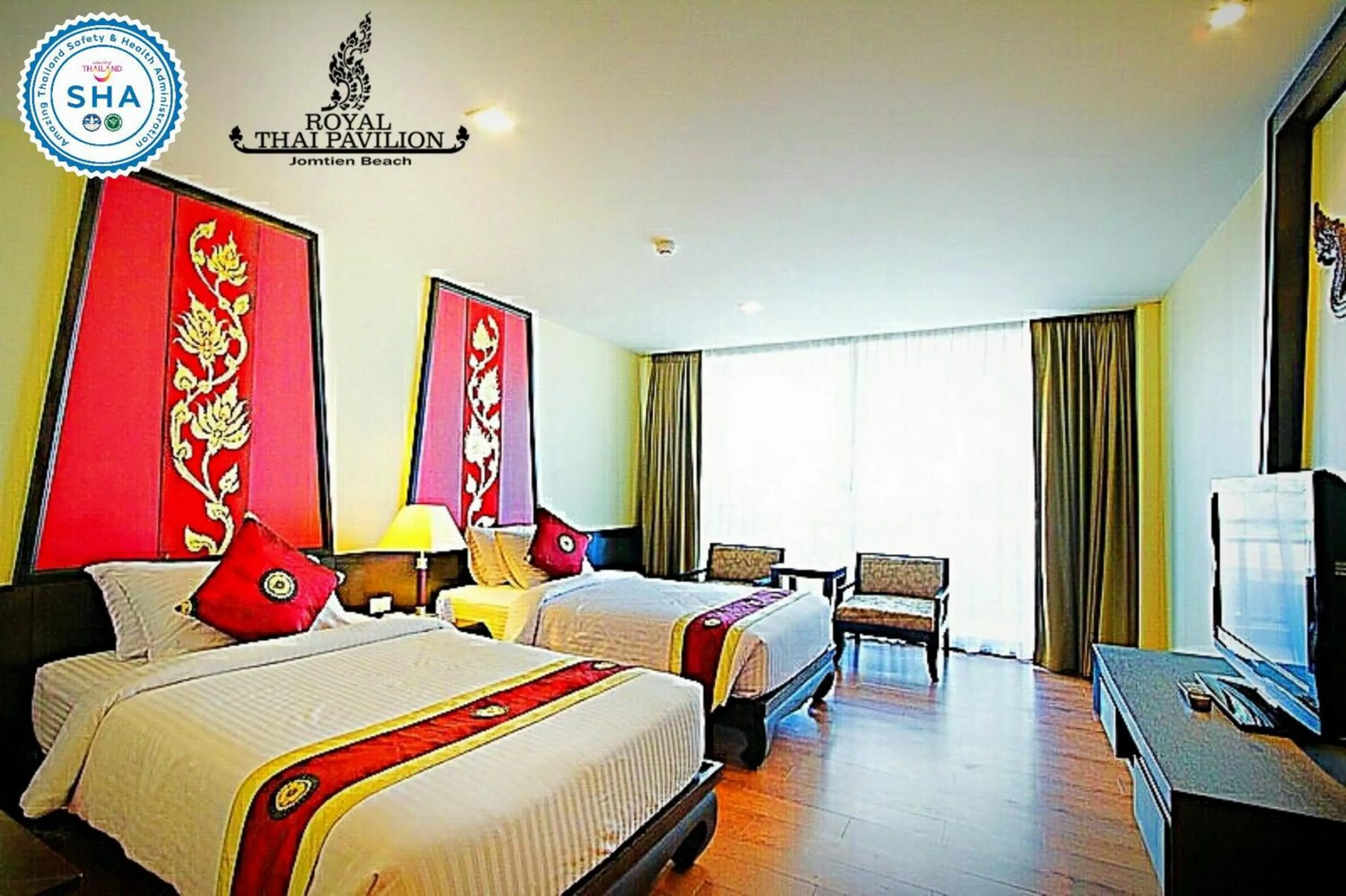 Bed in Royal Thai Pavilion Jomtien Hotel