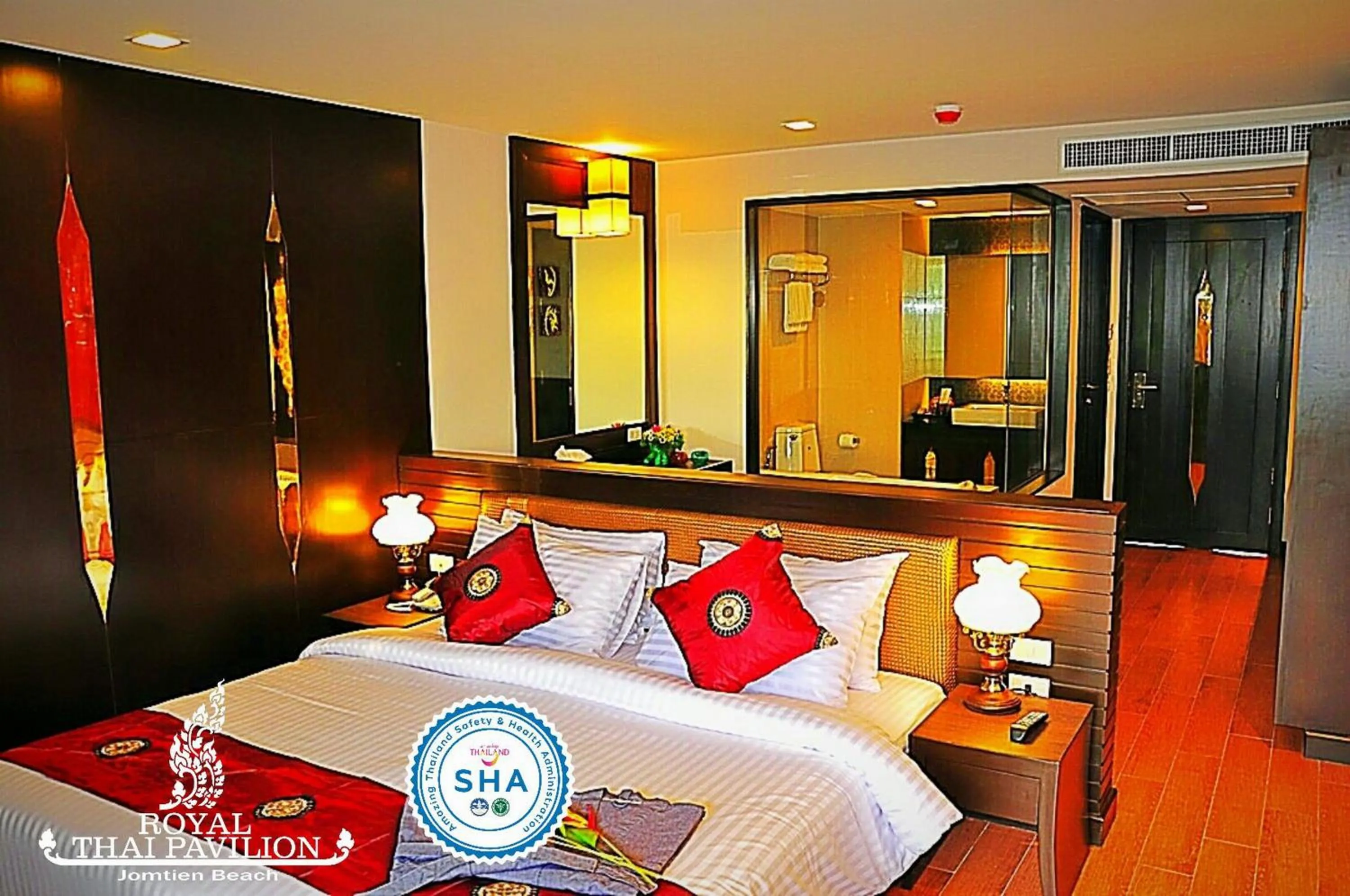 Bed in Royal Thai Pavilion Jomtien Hotel