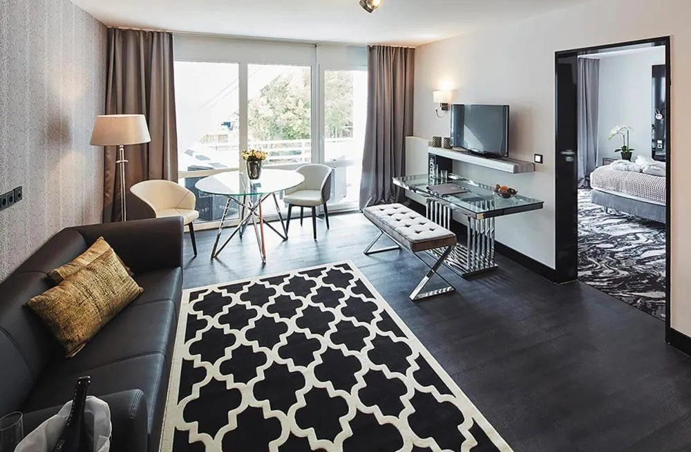 Bed in Kurhaus Design Boutique Hotel