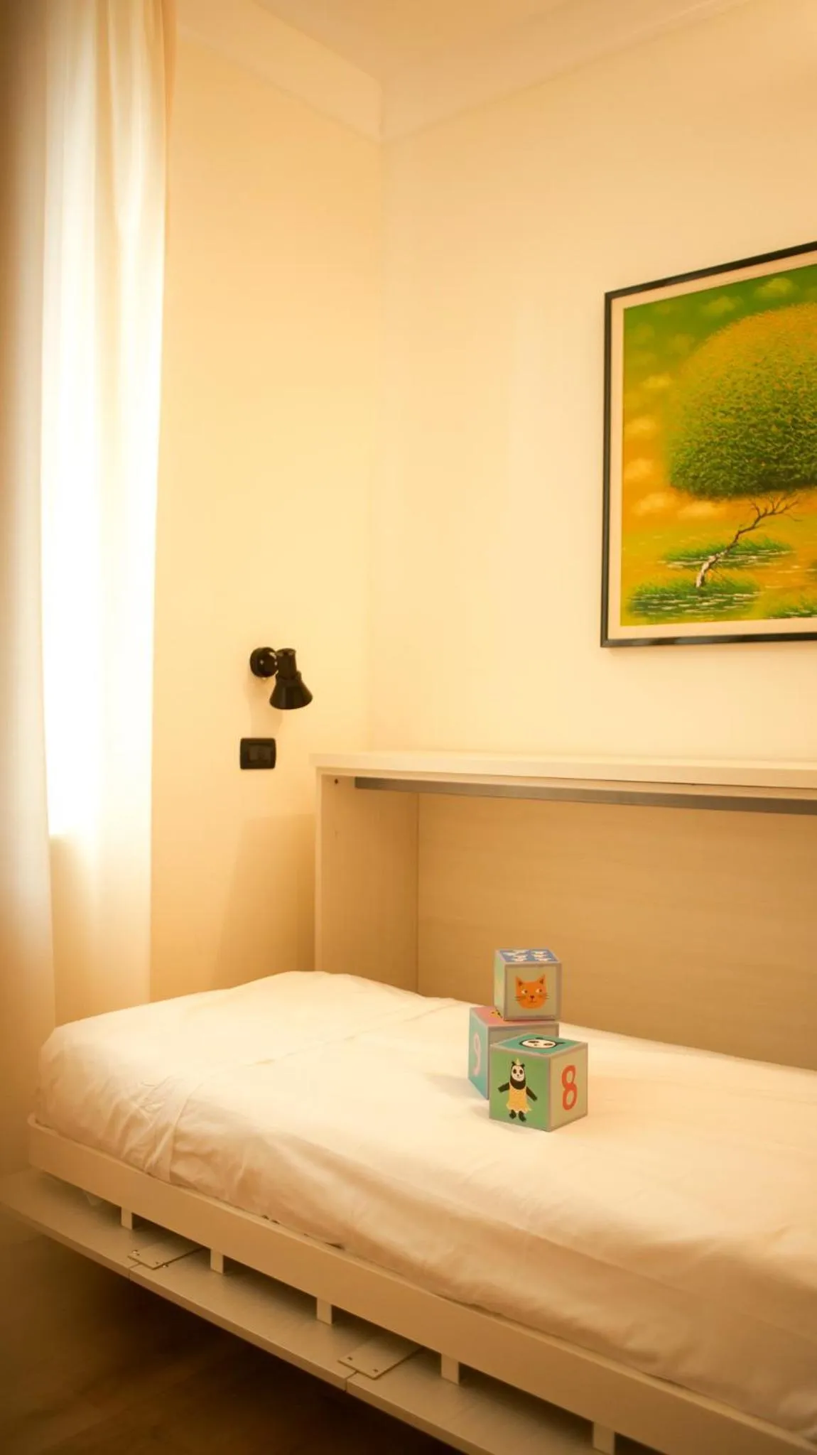 Bed in Rex Hotel Residence