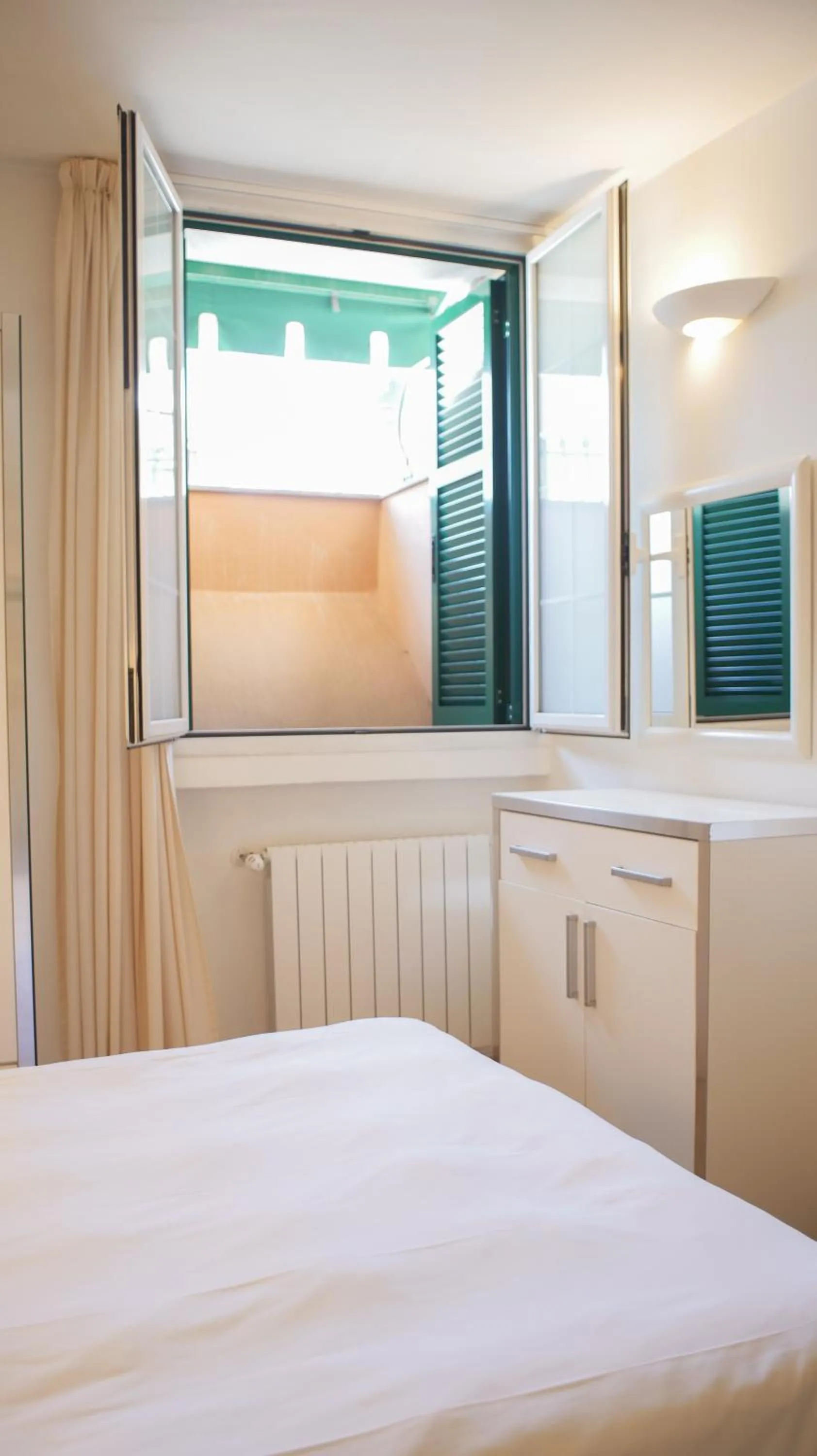 View (from property/room), Bed in Rex Hotel Residence