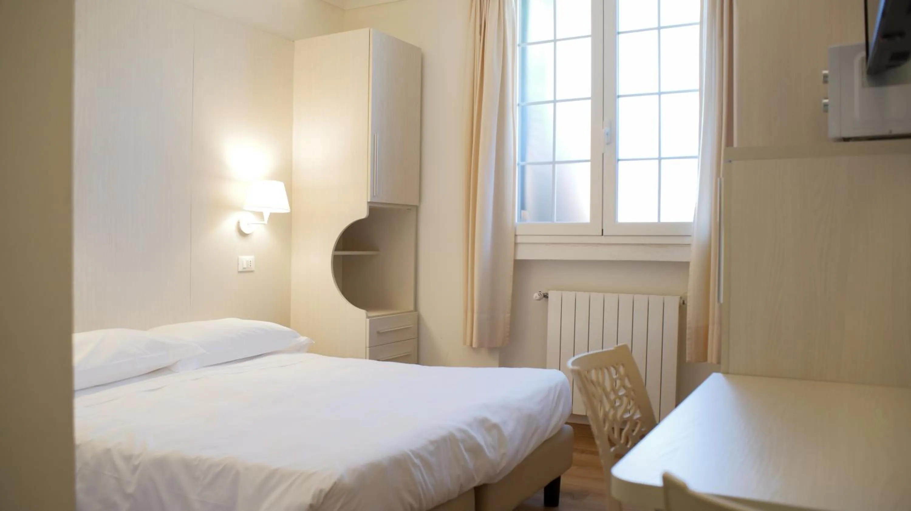 Photo of the whole room, Bed in Rex Hotel Residence