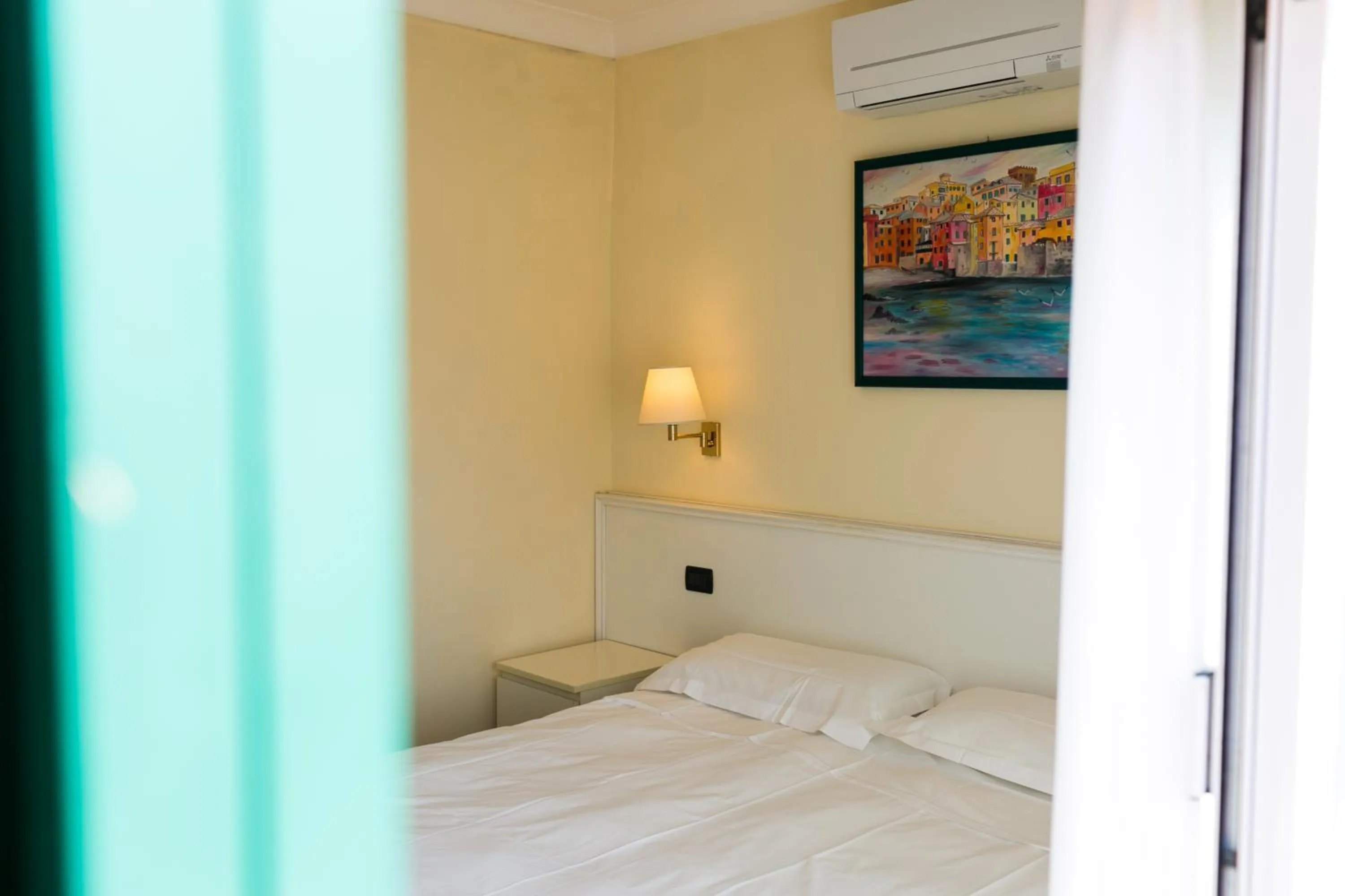 Bed in Rex Hotel Residence