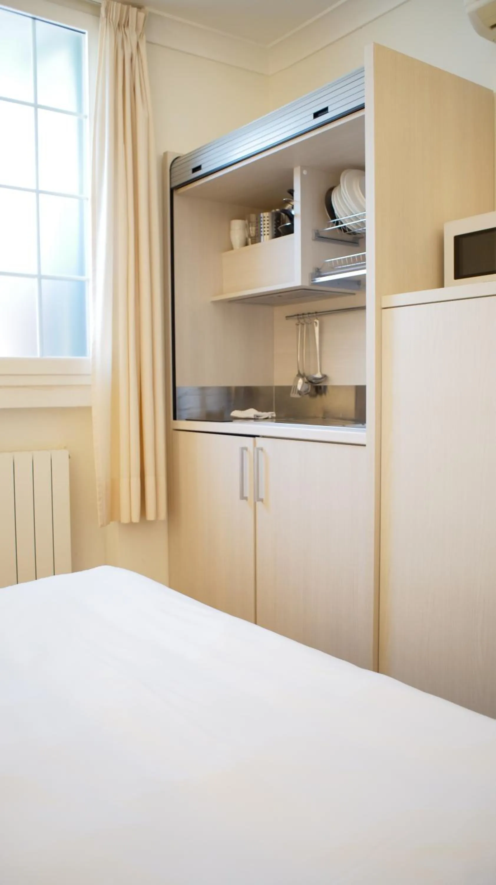 kitchen, Bed in Rex Hotel Residence
