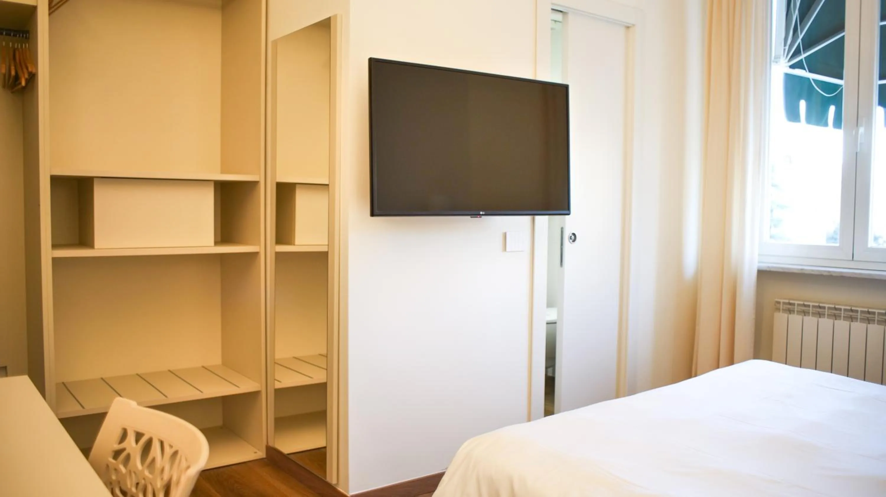 Bed in Rex Hotel Residence