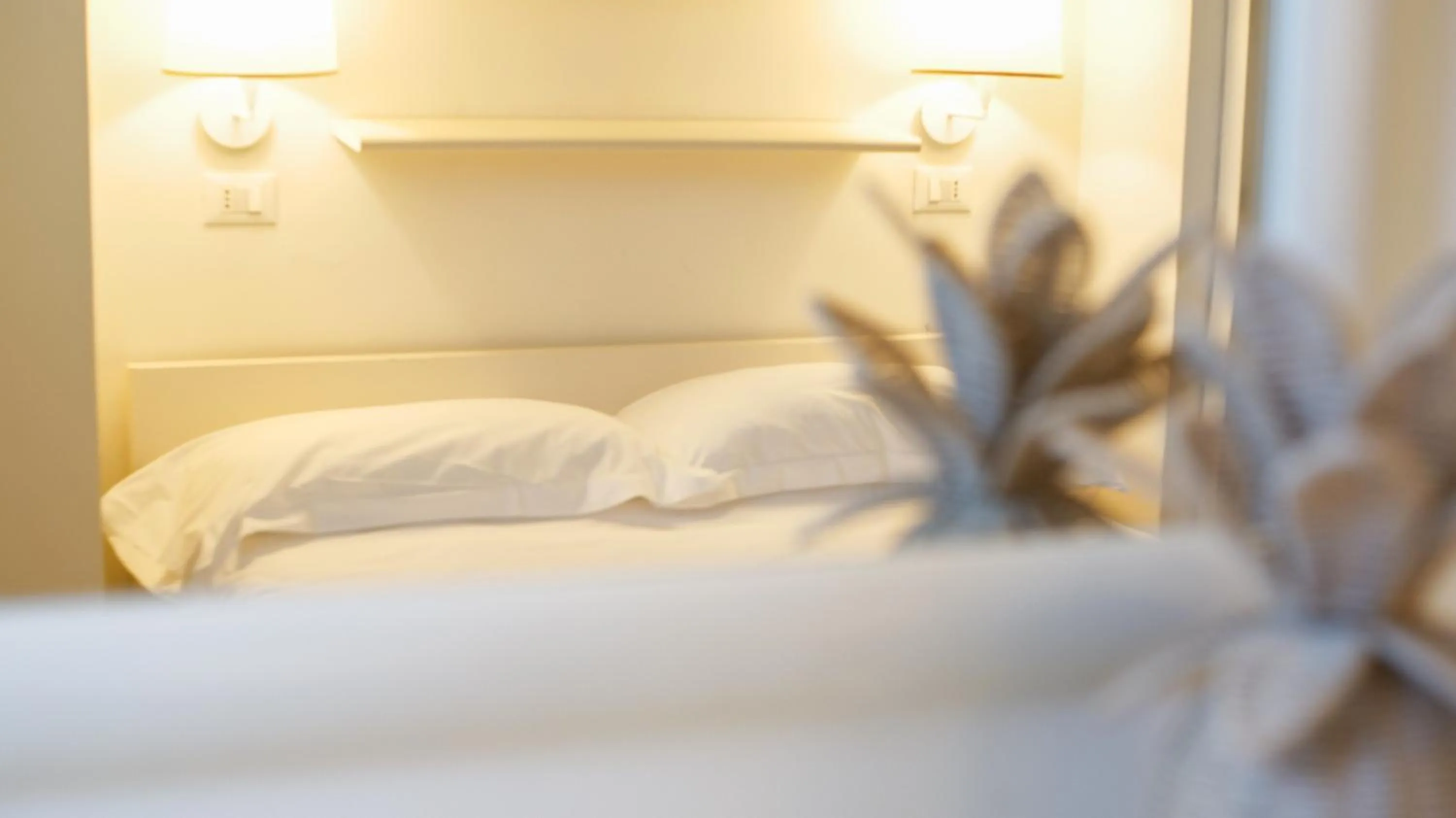 Bed in Rex Hotel Residence