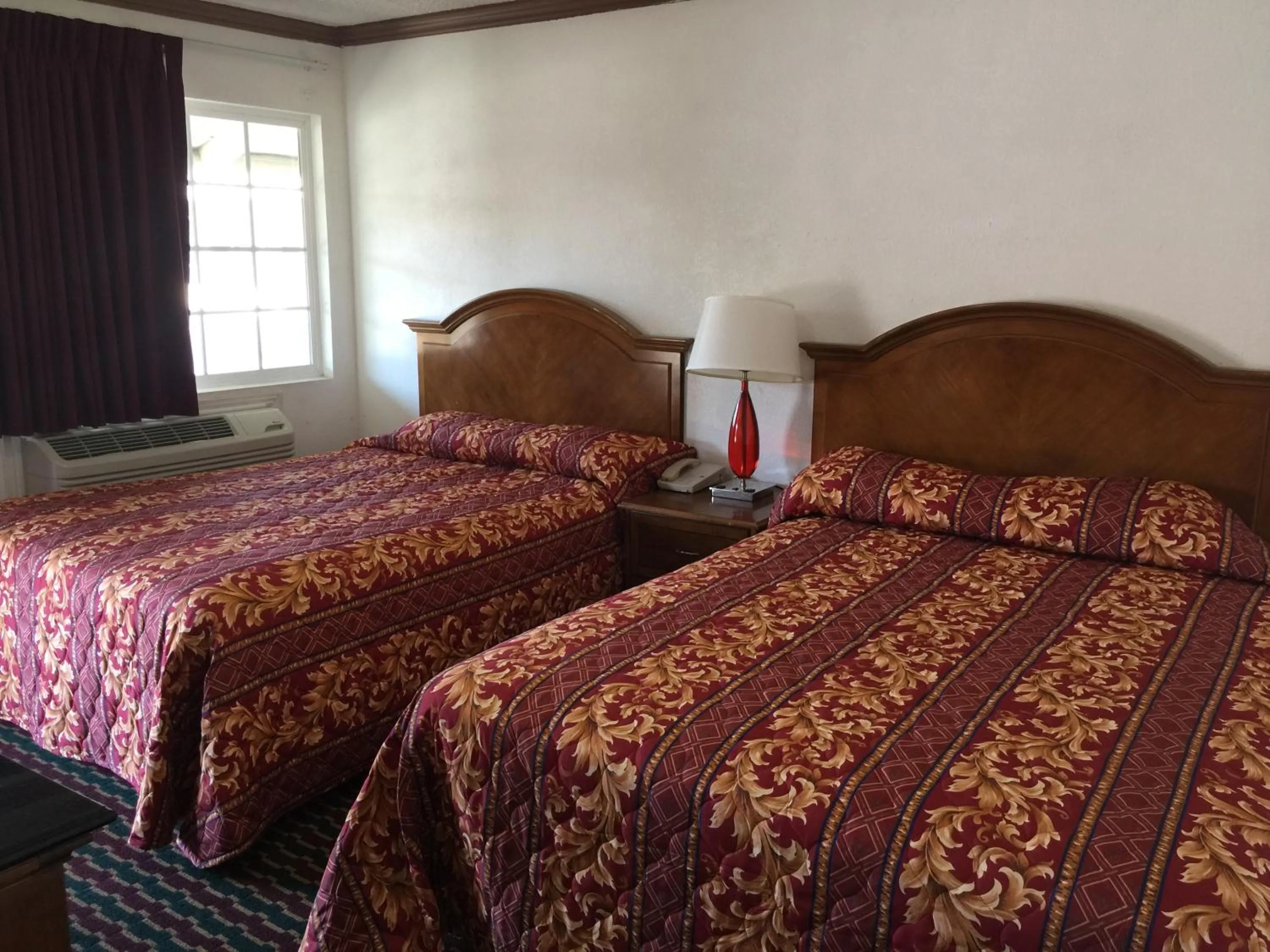 Bed in Buckboard Motel