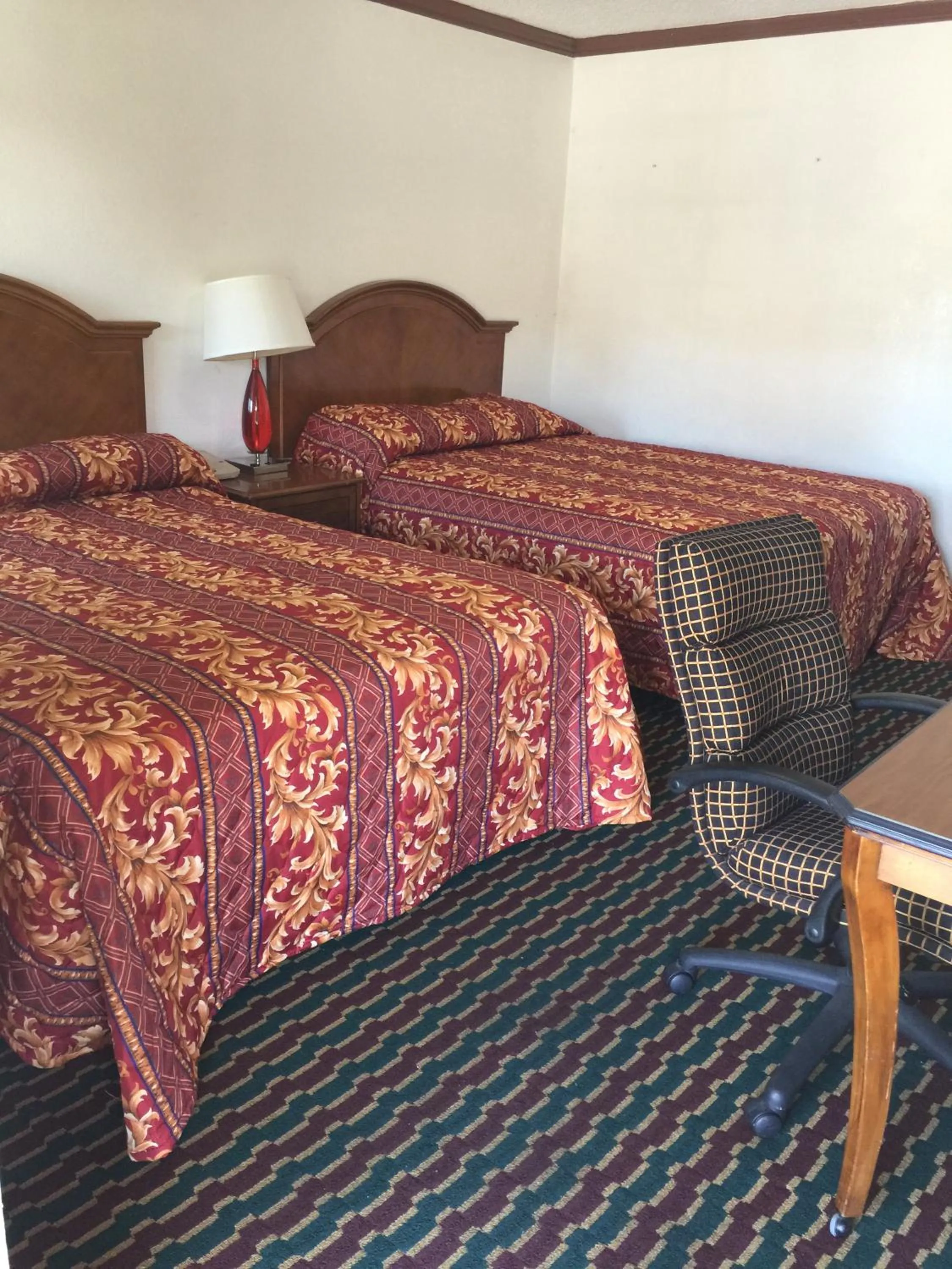 Bed in Buckboard Motel