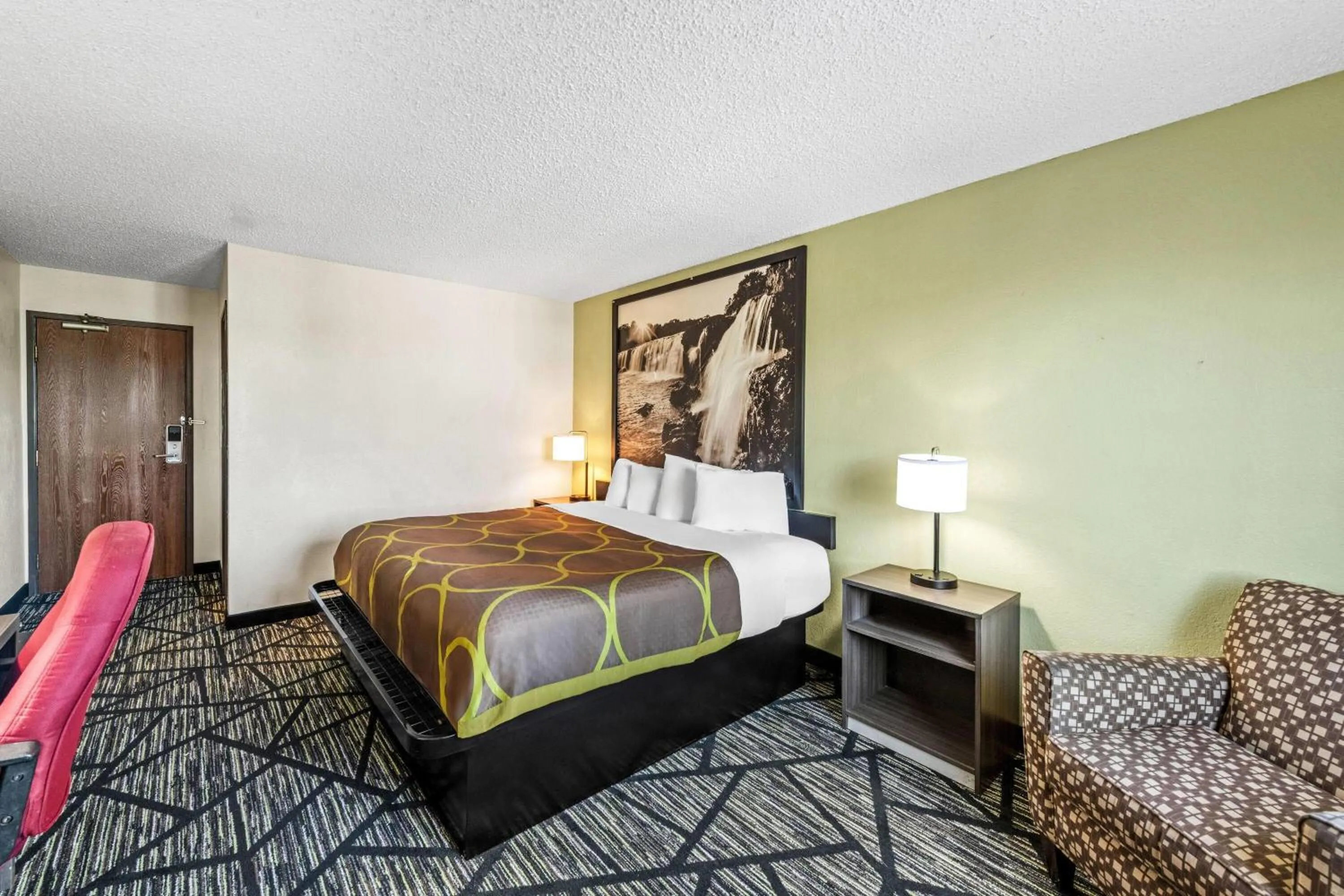 Bed in Super 8 by Wyndham Independence Kansas City