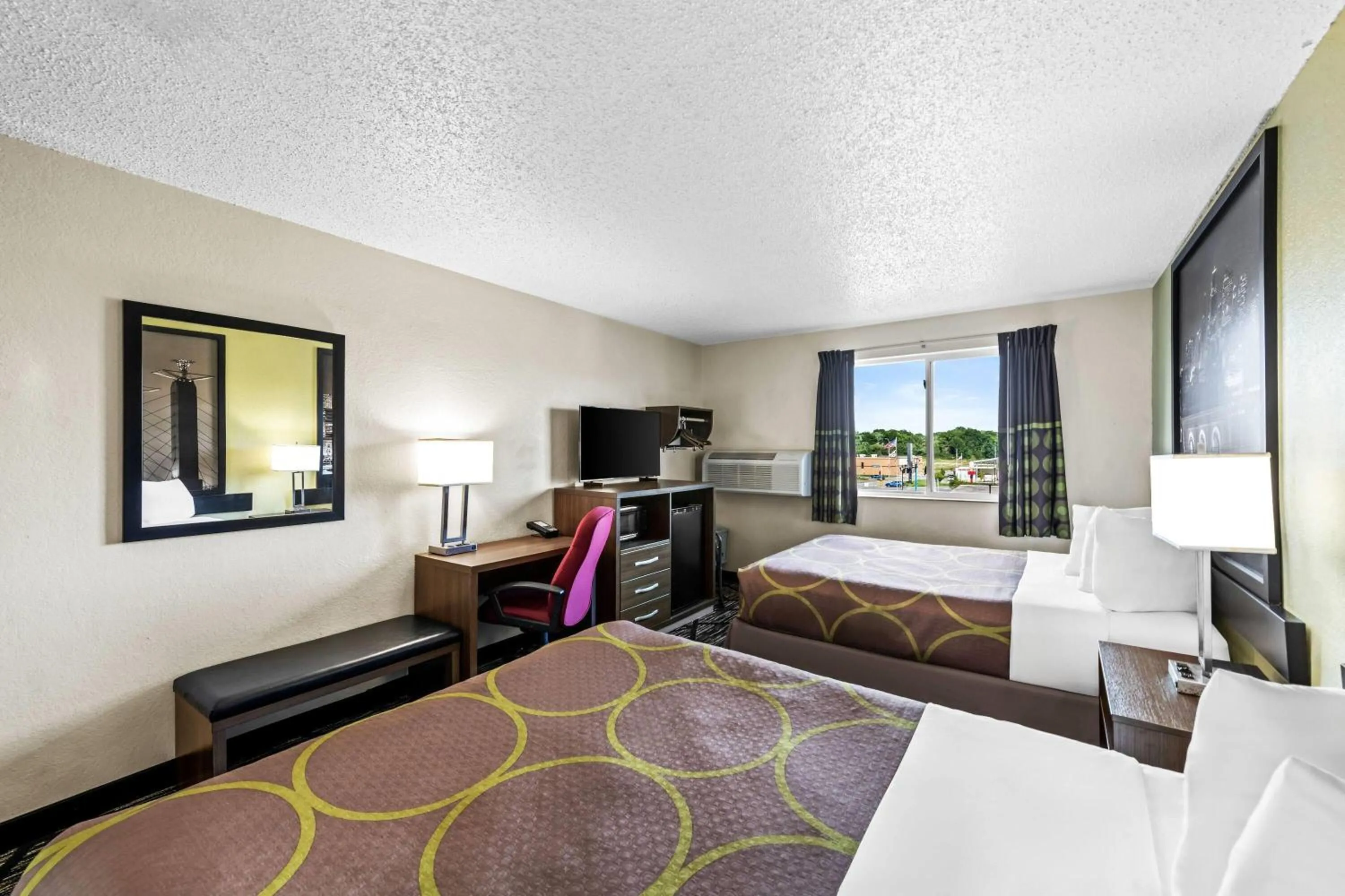 Bed in Super 8 by Wyndham Independence Kansas City