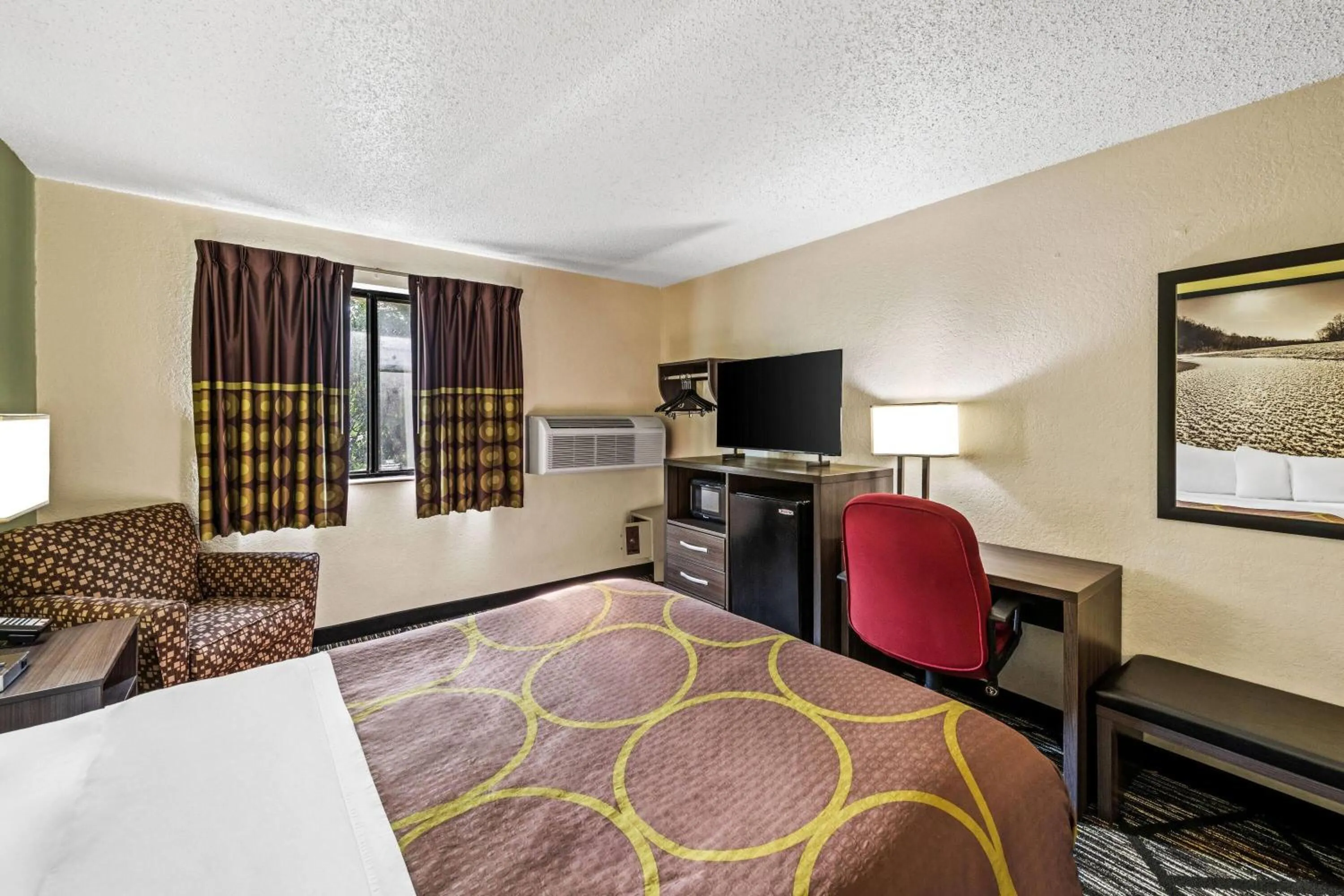 Bed in Super 8 by Wyndham Independence Kansas City
