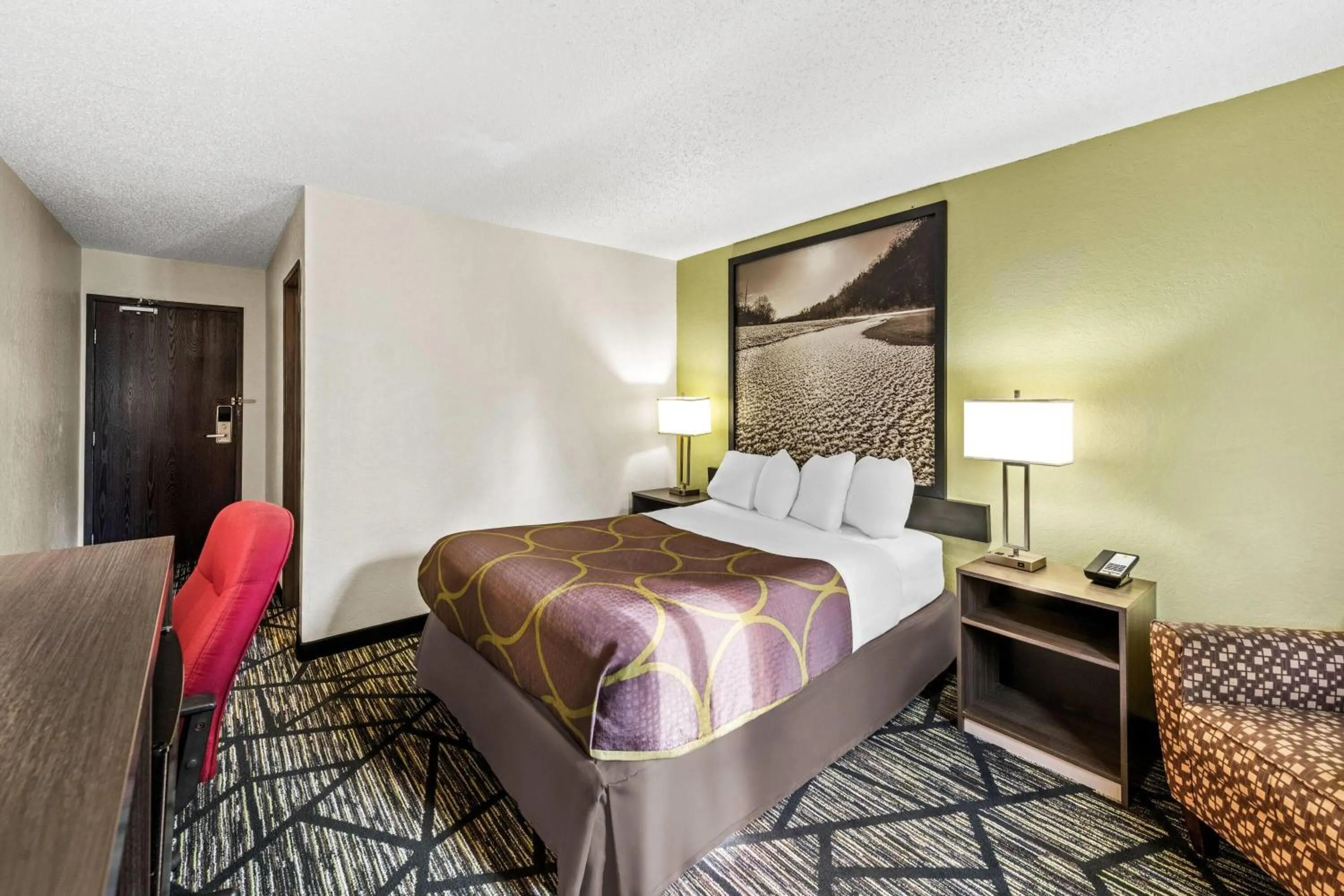 Bed in Super 8 by Wyndham Independence Kansas City