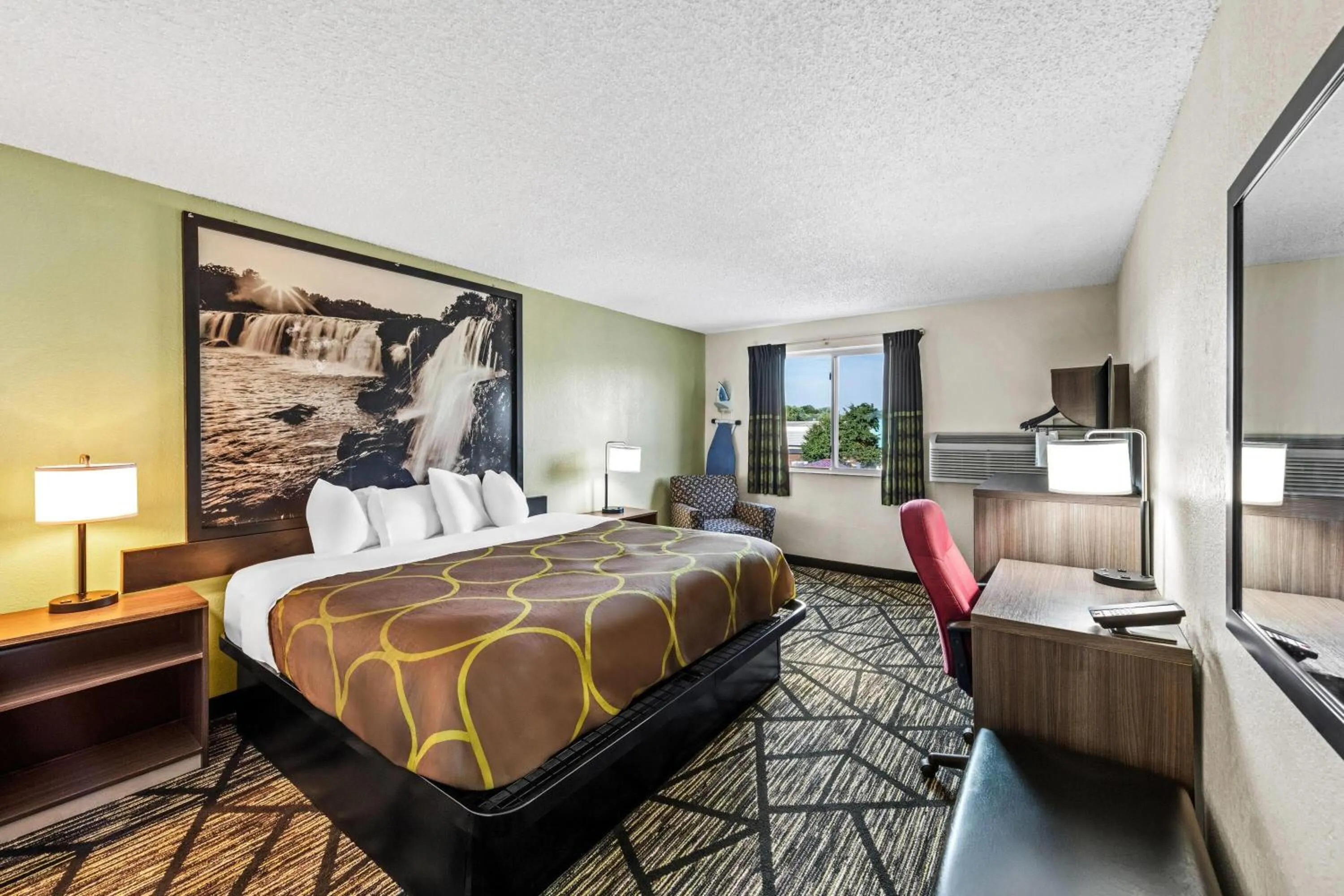 Bed in Super 8 by Wyndham Independence Kansas City