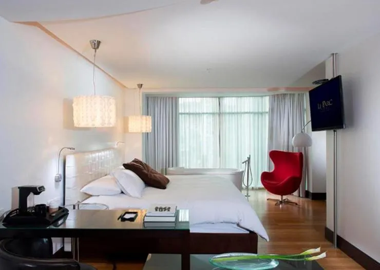 Bed in Le Parc Hotel, Beyond Stars