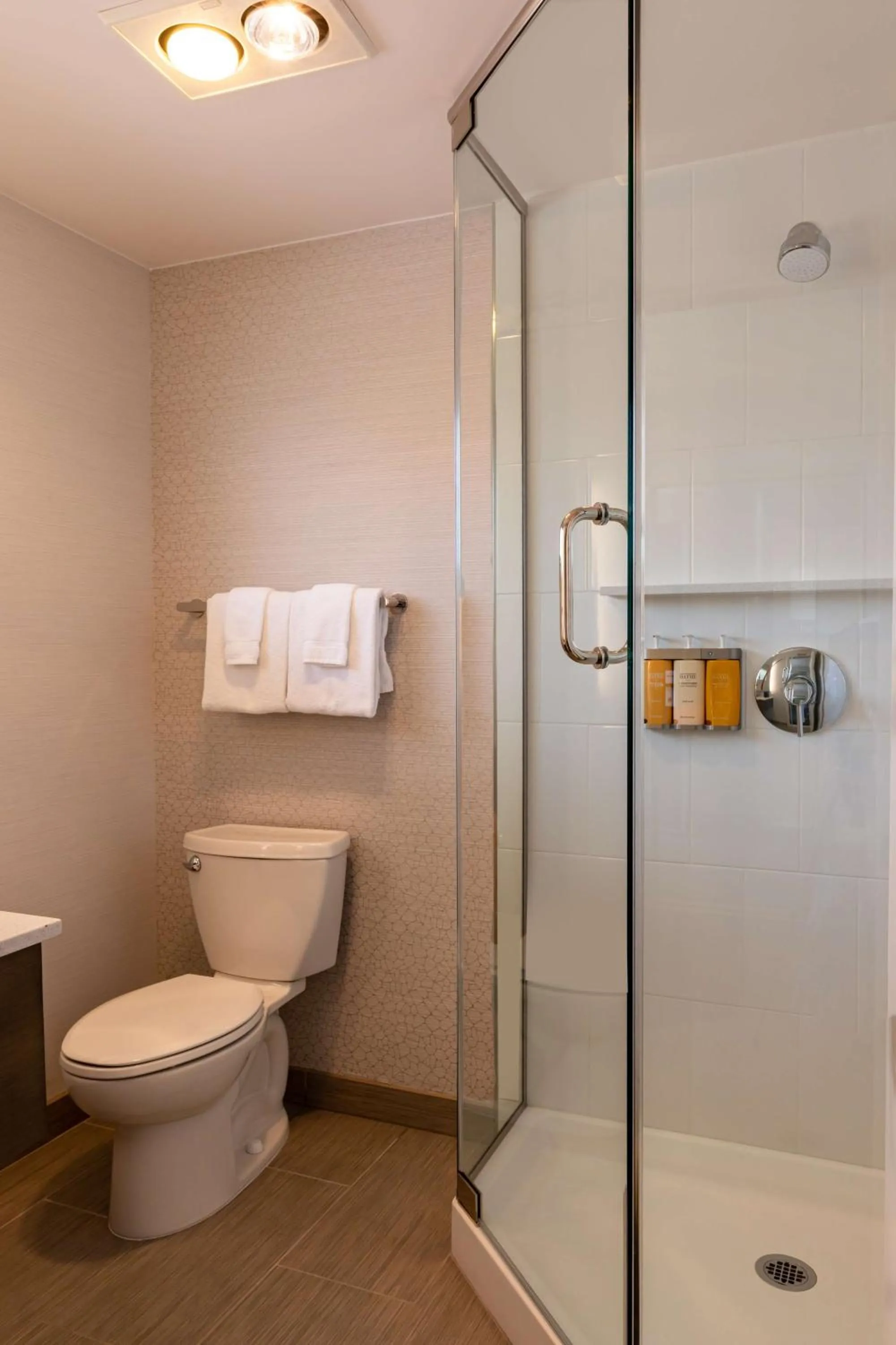 Bathroom in West Beach Inn, a Coast Hotel