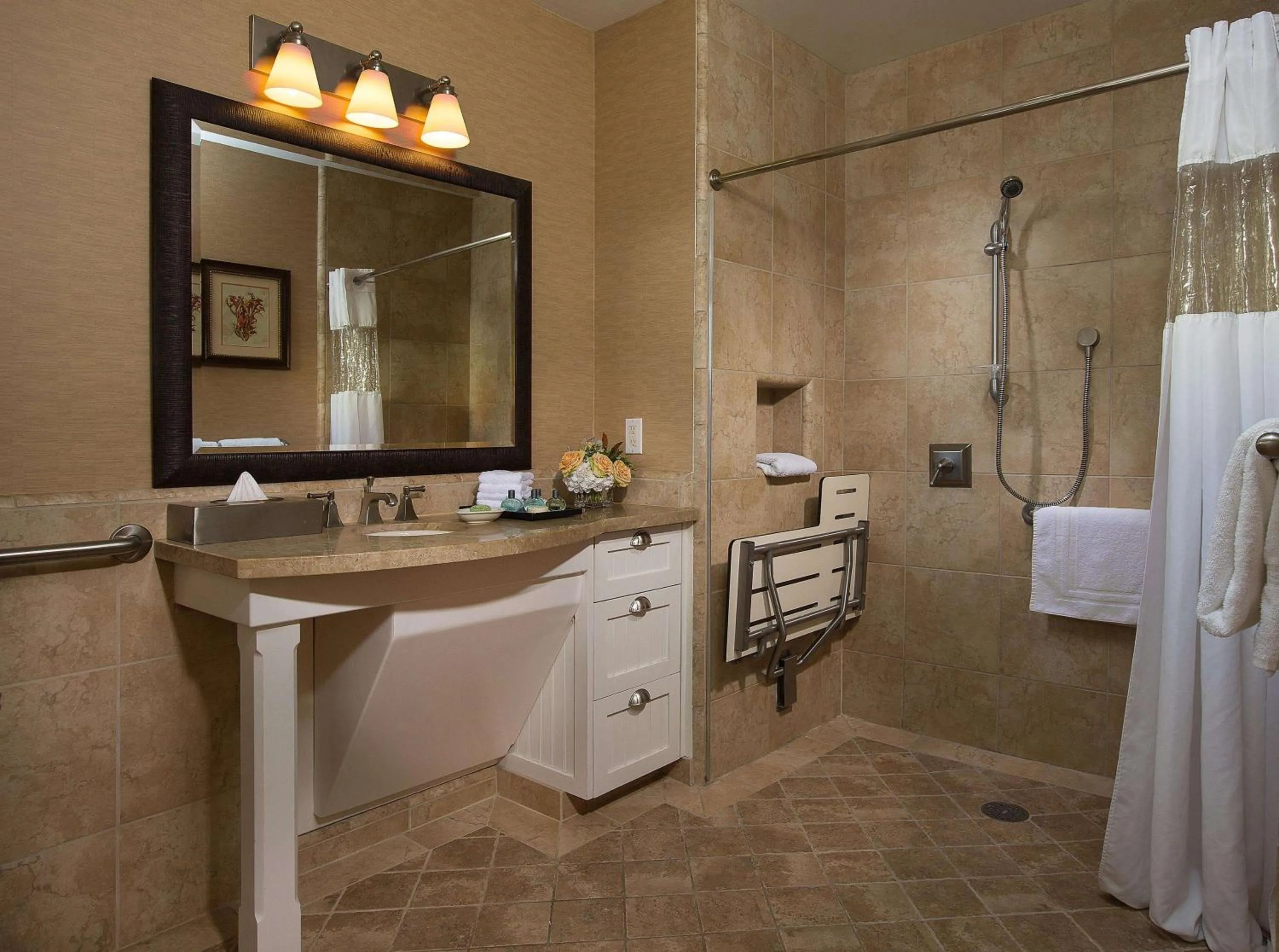 Shower in West Beach Inn, a Coast Hotel