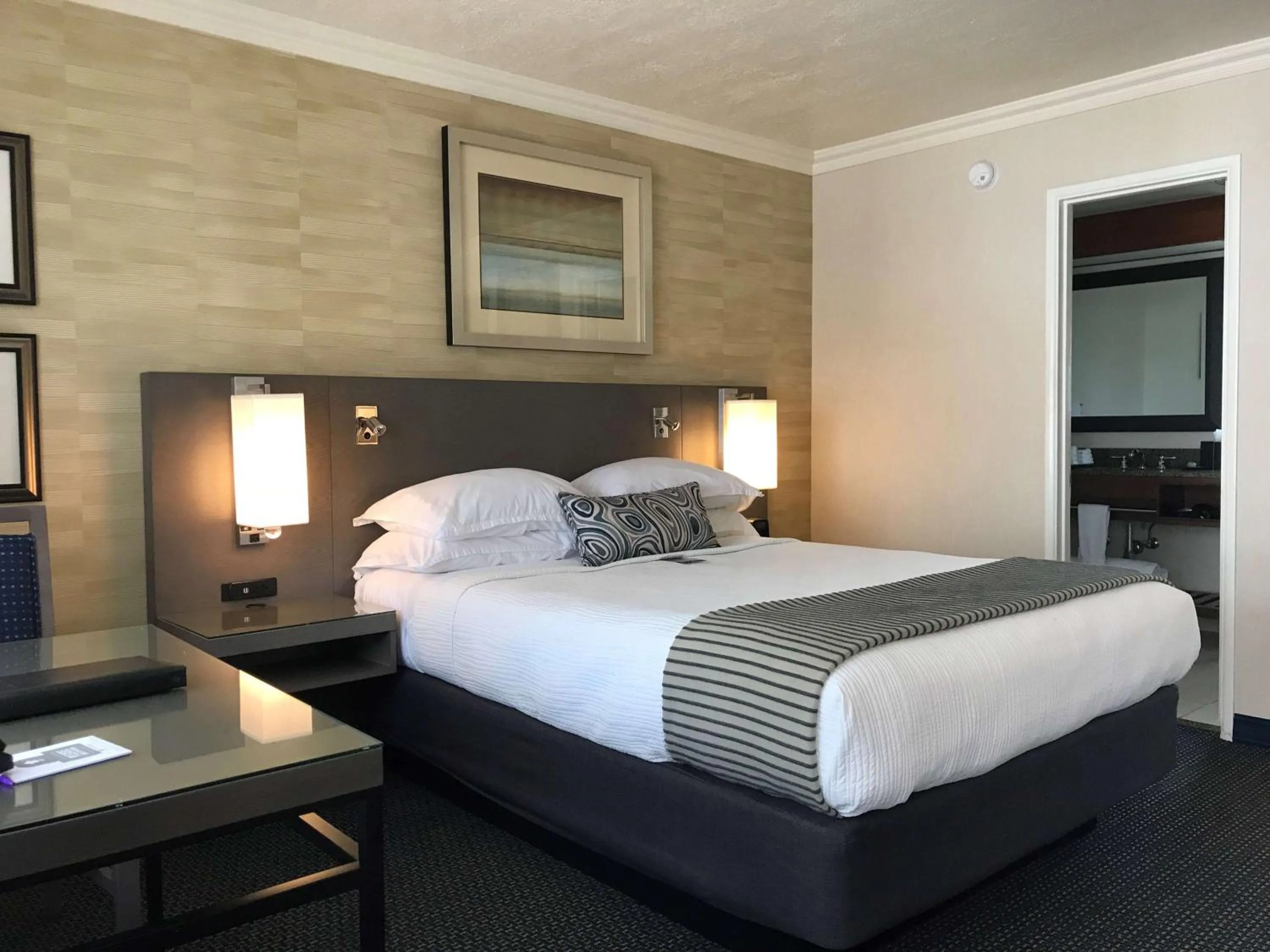 Bedroom, Bed in West Beach Inn, a Coast Hotel