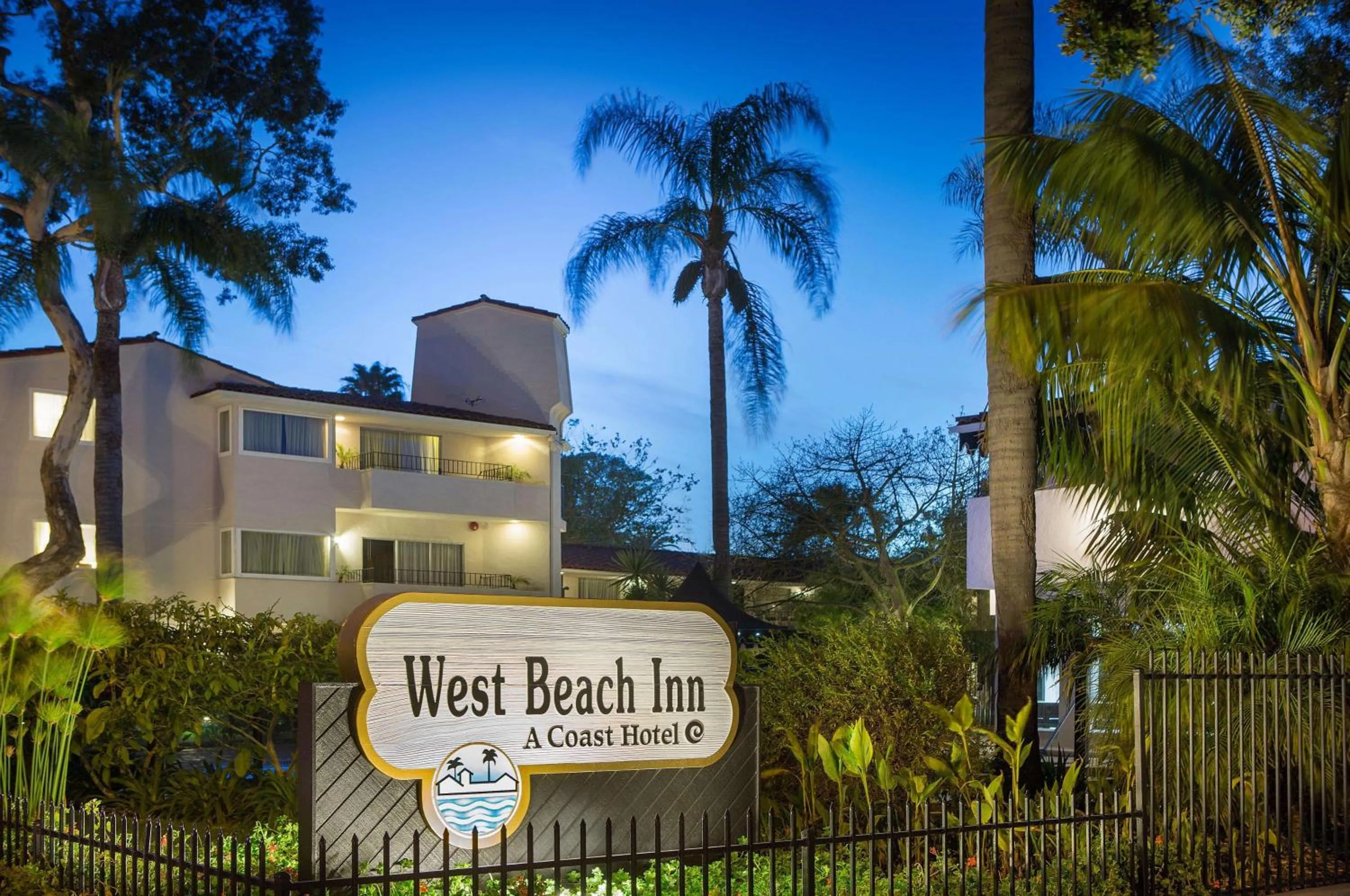 Property building in West Beach Inn, a Coast Hotel