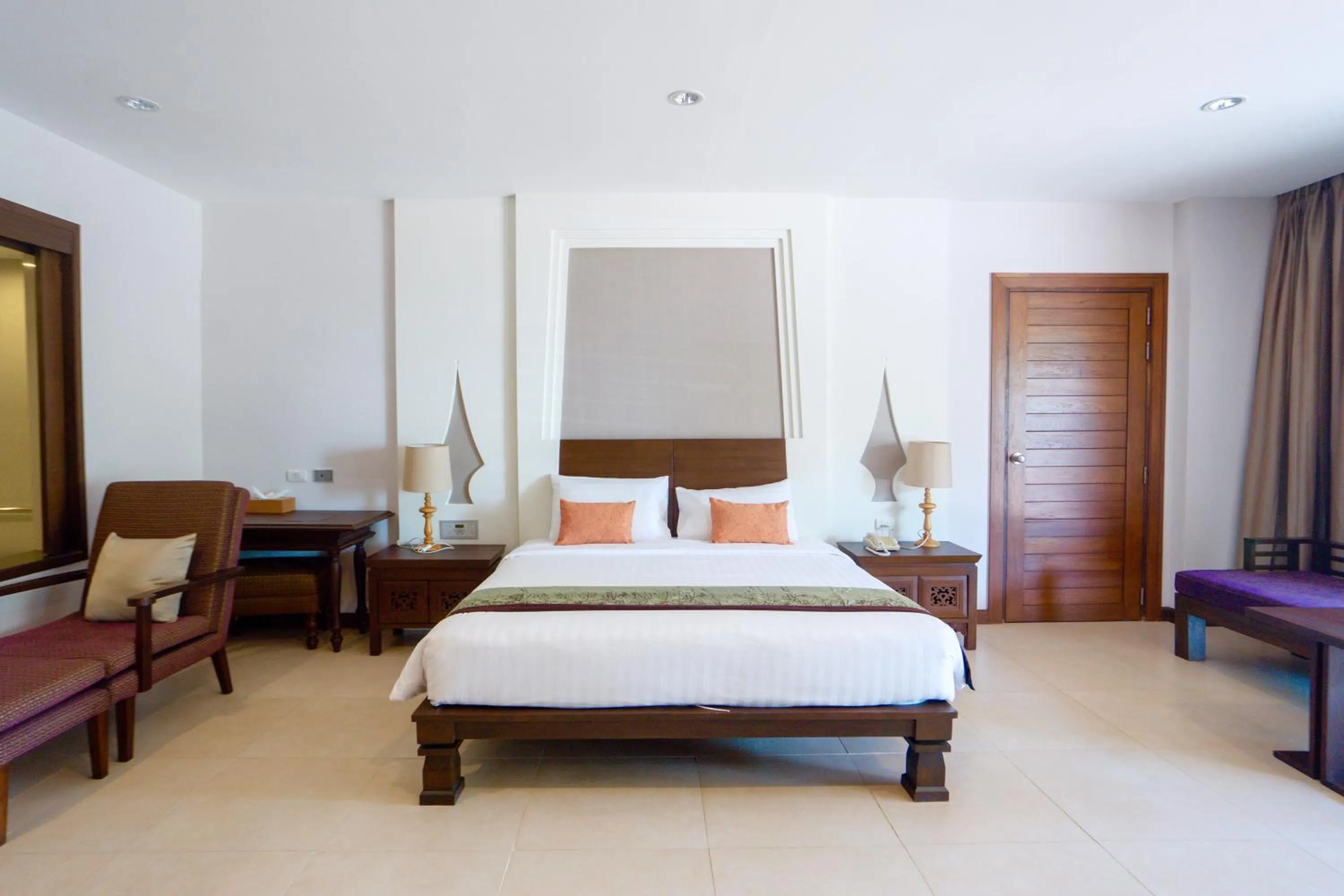 Bed in The Heritage Pattaya Beachfront Resort